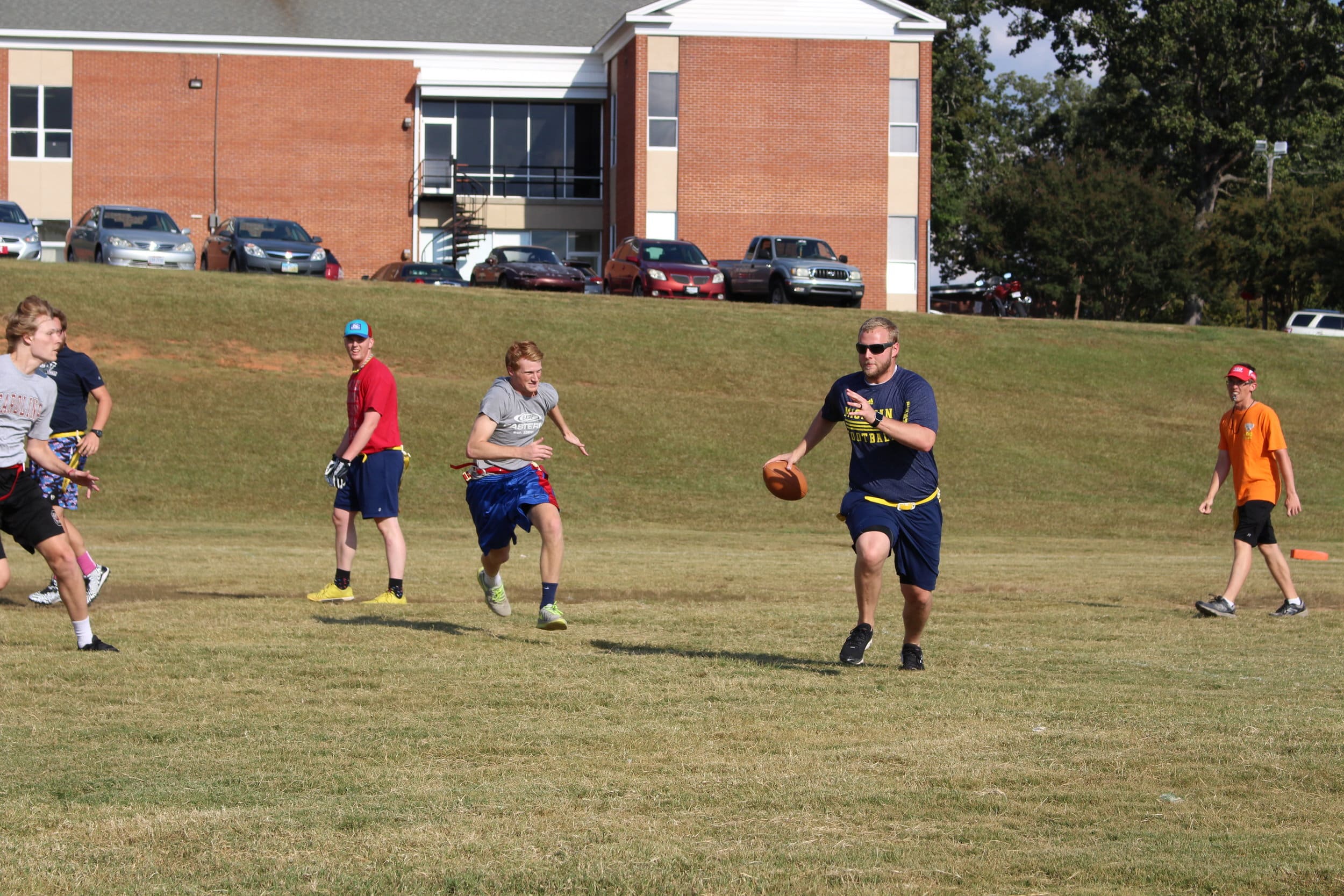  Like Father, Like Son quarterback, Kyle Roberts,&nbsp;breaks and takes the chance to run the ball down the field.&nbsp; 