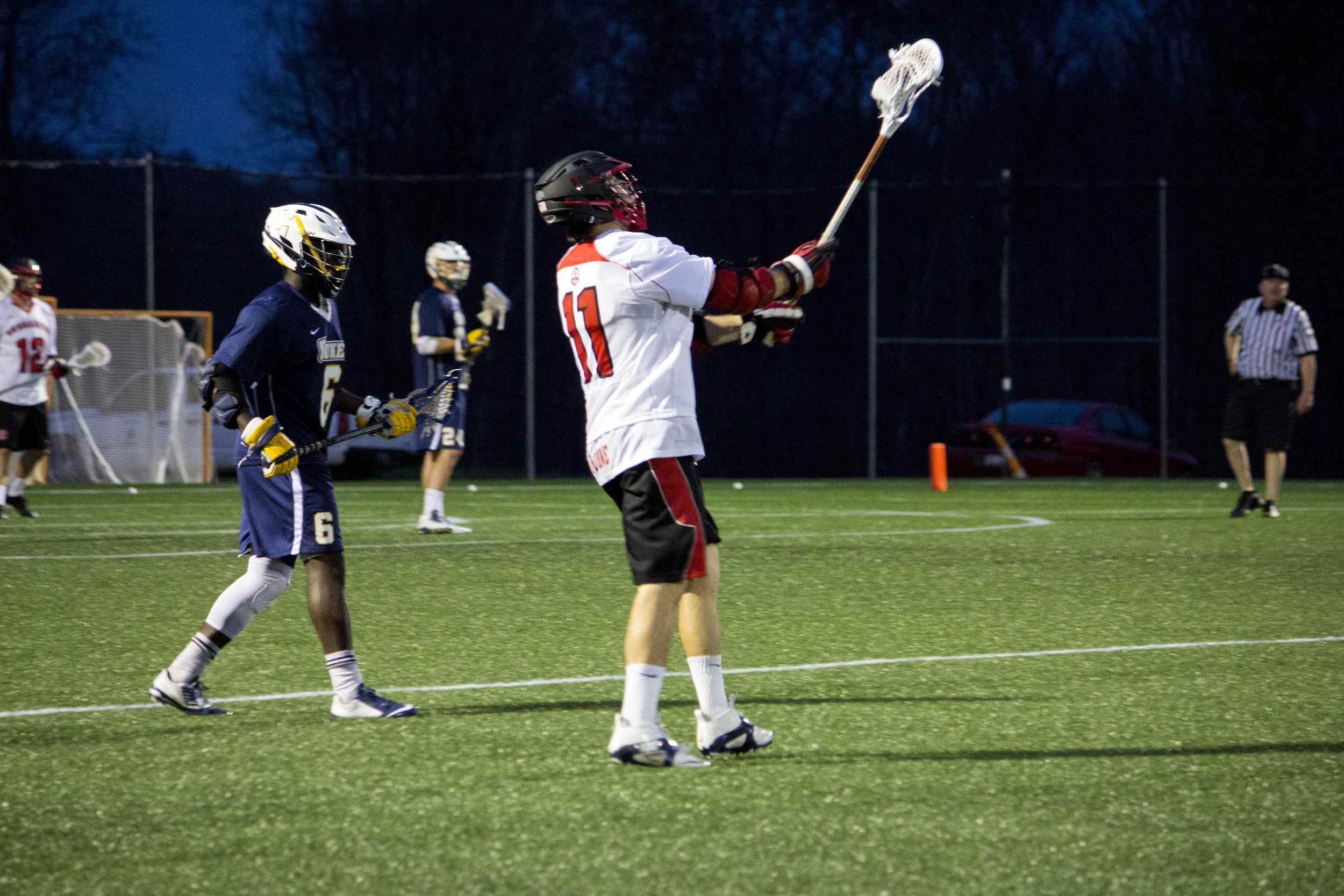  Sophomore Drew Wassenaar switches&nbsp;the play to the other side of the field.&nbsp; 