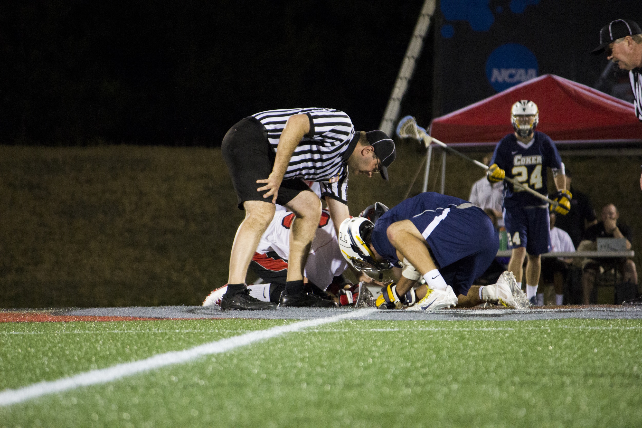  The referee places the ball before both team members try and&nbsp;wrestle the ball from each other to hand off to their other teammates.&nbsp; 