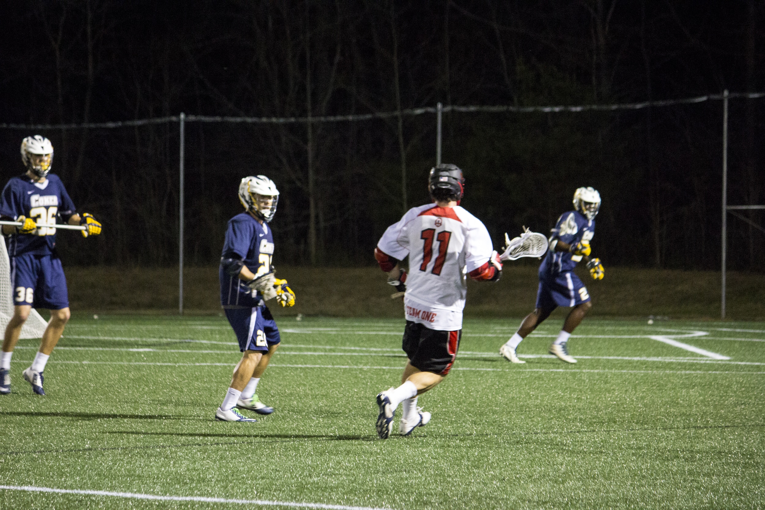  Sophomore Drew Wassenaar carries&nbsp;the ball towards the goal in attempt to make another goal.&nbsp; 