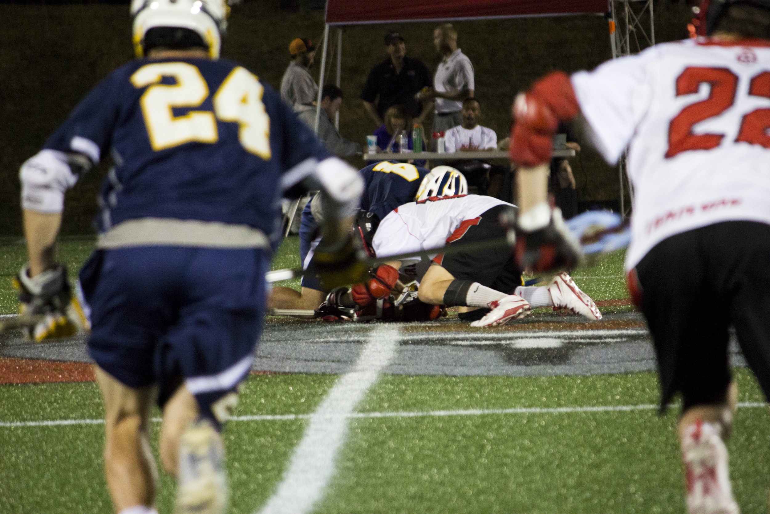  Freshman Allen McBride races towards the center to help his teammate win over the ball.&nbsp; 