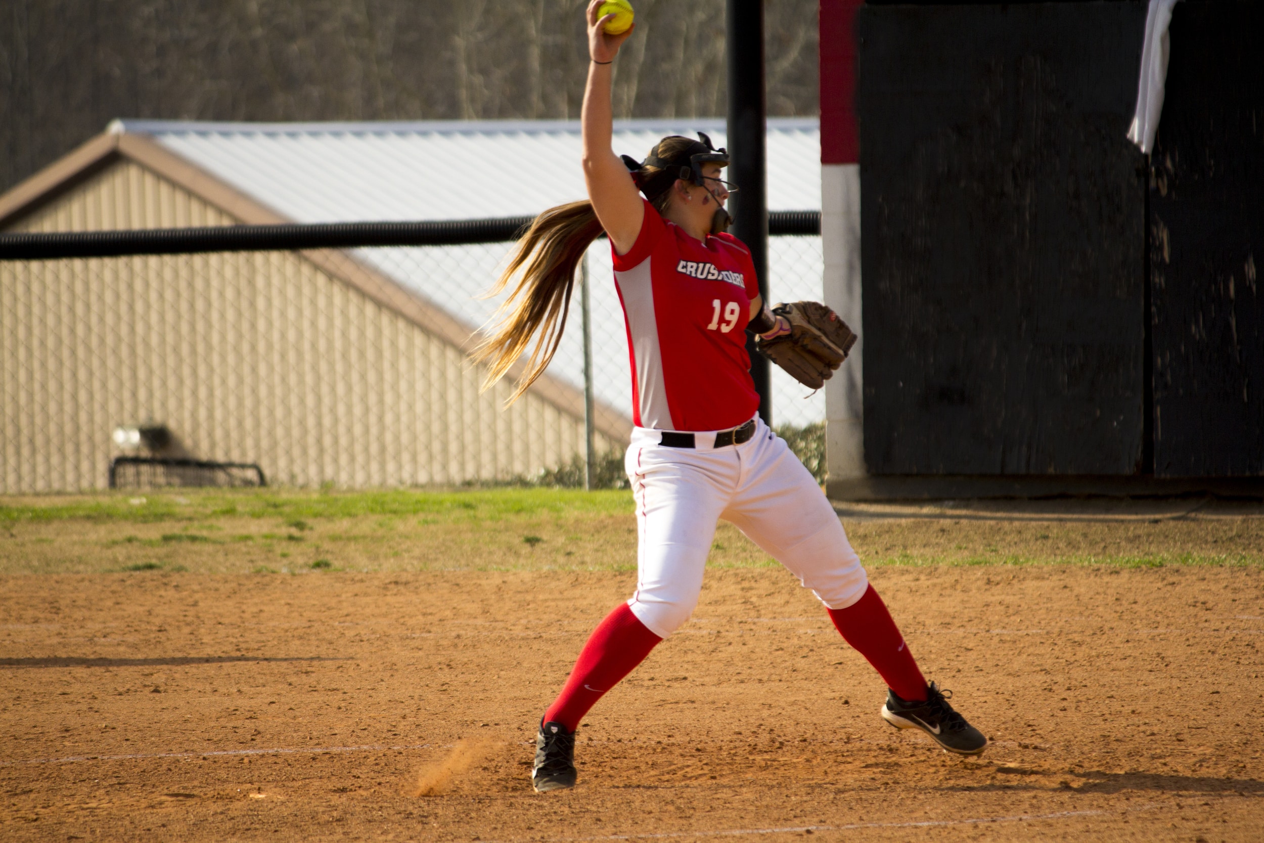  Freshman Emily Murphy winds up to pitch the ball.&nbsp; 