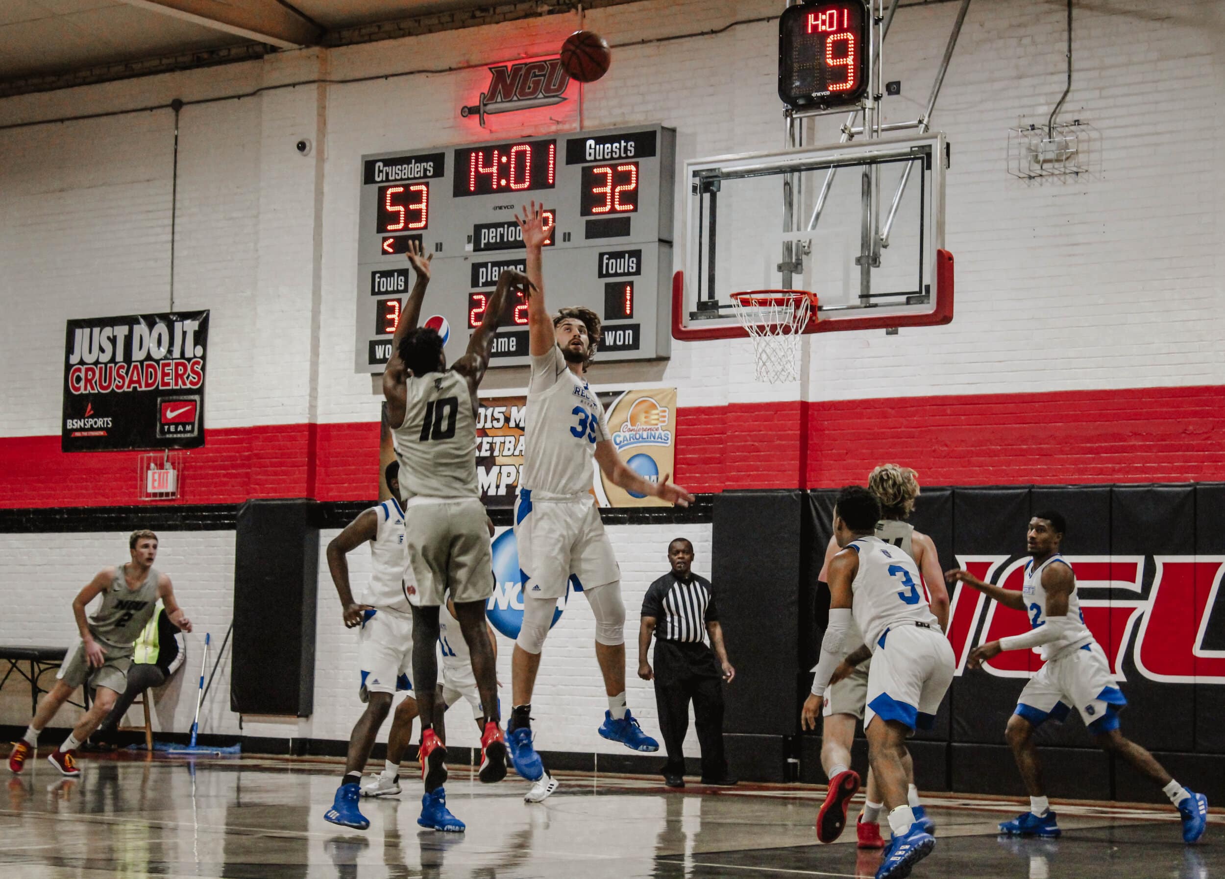 DJ Brooks (10) takes a jump shot with nine seconds left on the shot clock.