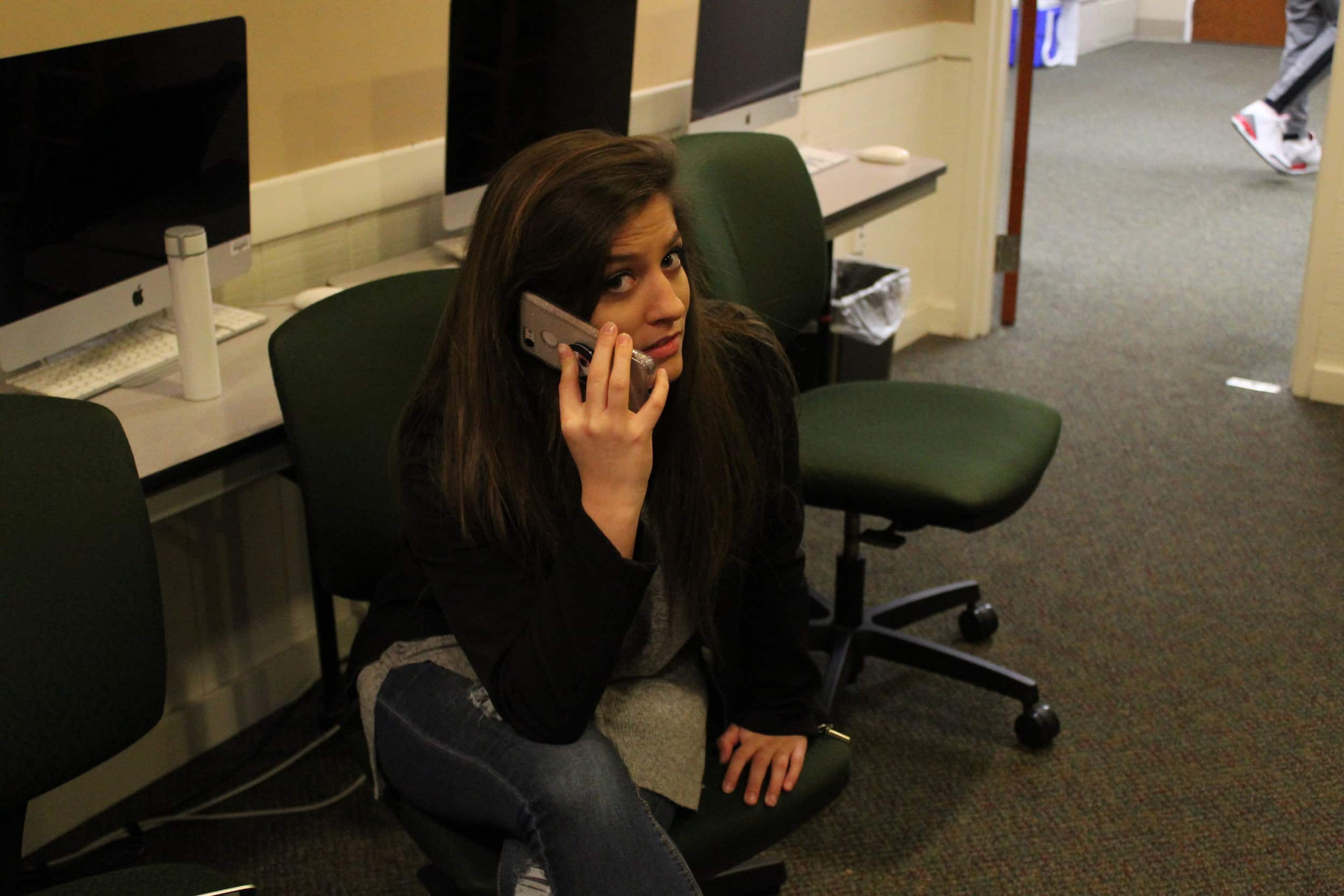 Sophomore, Vivian Wortkoetter, is caught on the phone talking to her friend.