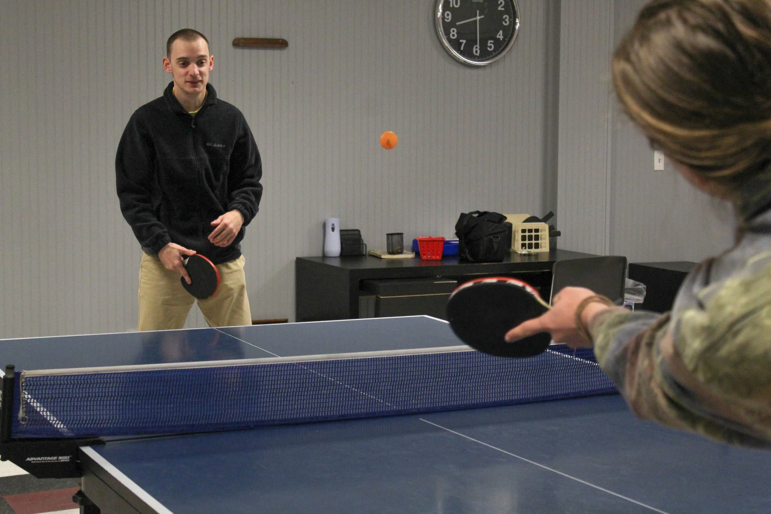 Junior Josh and freshmen Jacob battle at a game of ping-pong.