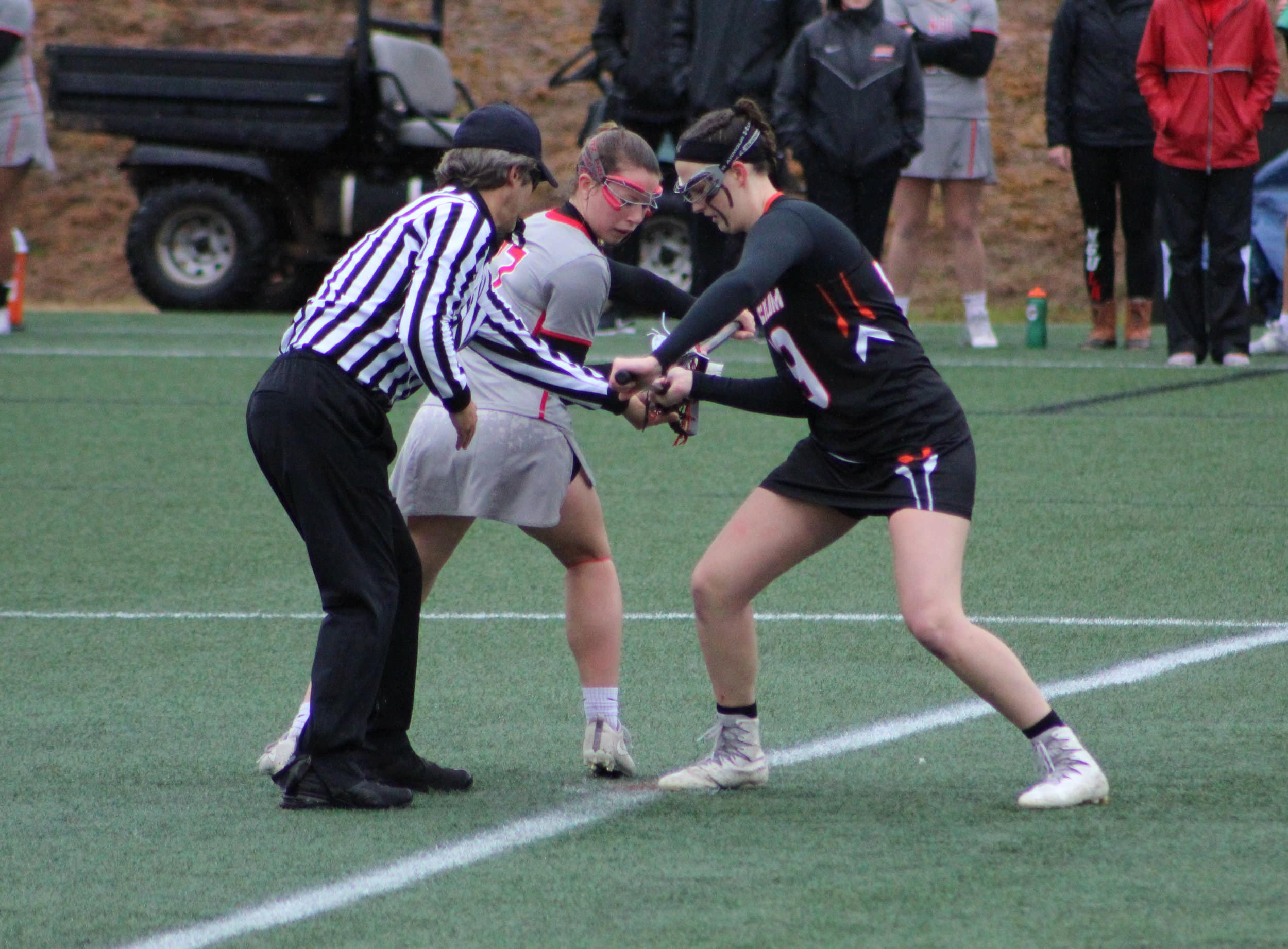 Junior, Kaitlin Yenson, 3, prepares to catch the ball during the draw of the game.