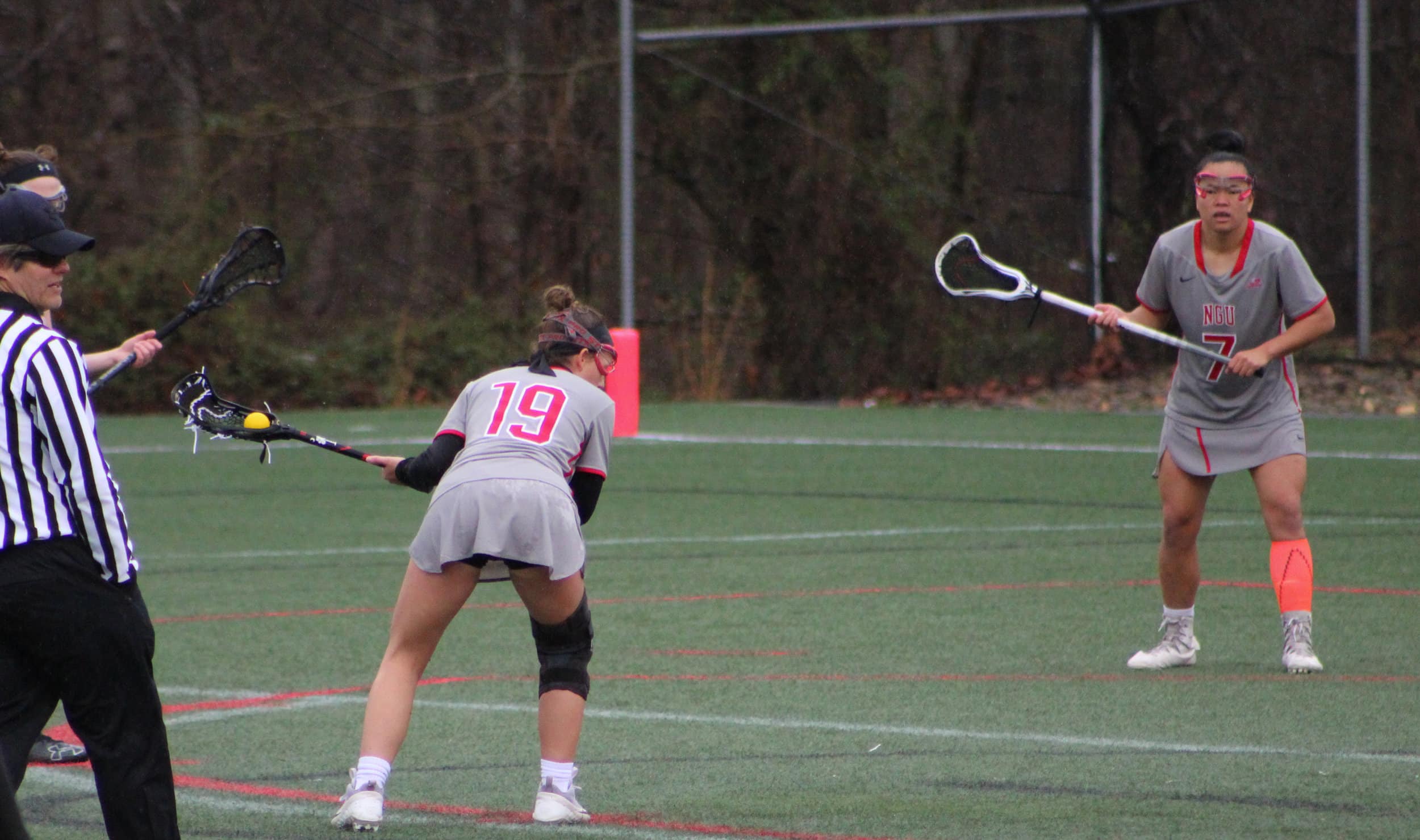 Junior, Aly Estes, 19, approaches closer to the goalie with the help of player 7.