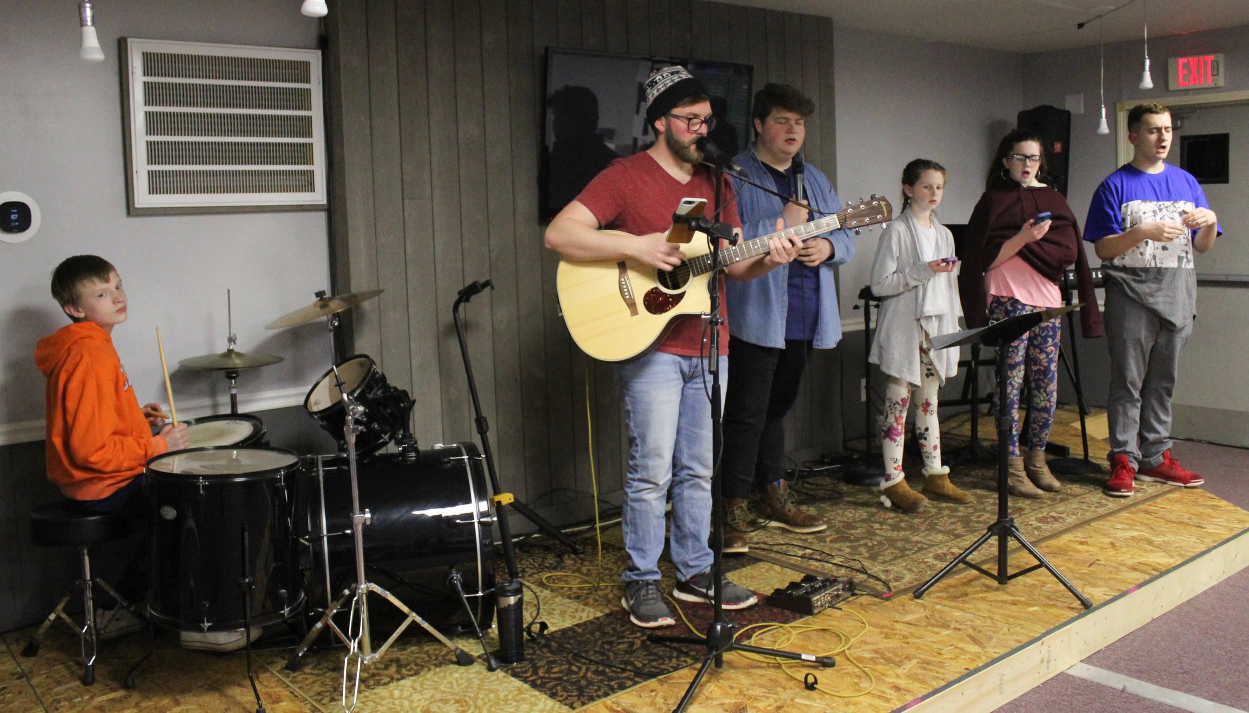 The White Flag Youth Ministry band practices before a Wednesday night of service.