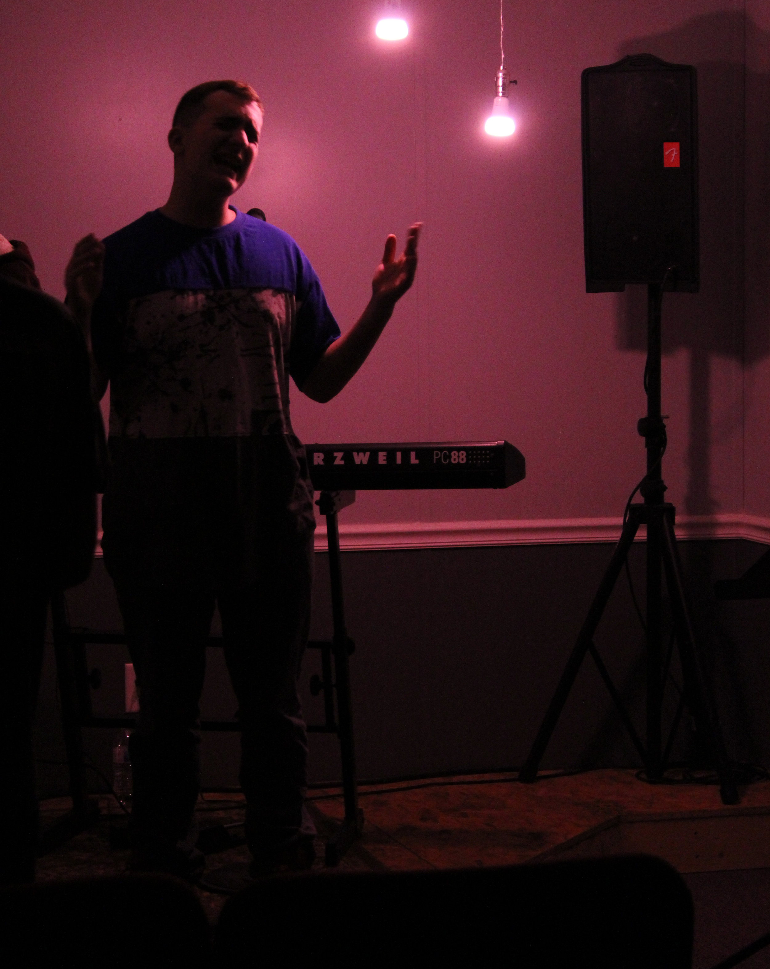In the White Flag Youth Ministry, ranging from ages 12-18, students are encouraged to seek after God daily and are taught biblical and relatable material week after week. Pictured here is Noah Milholan singing on stage and worshipping God.