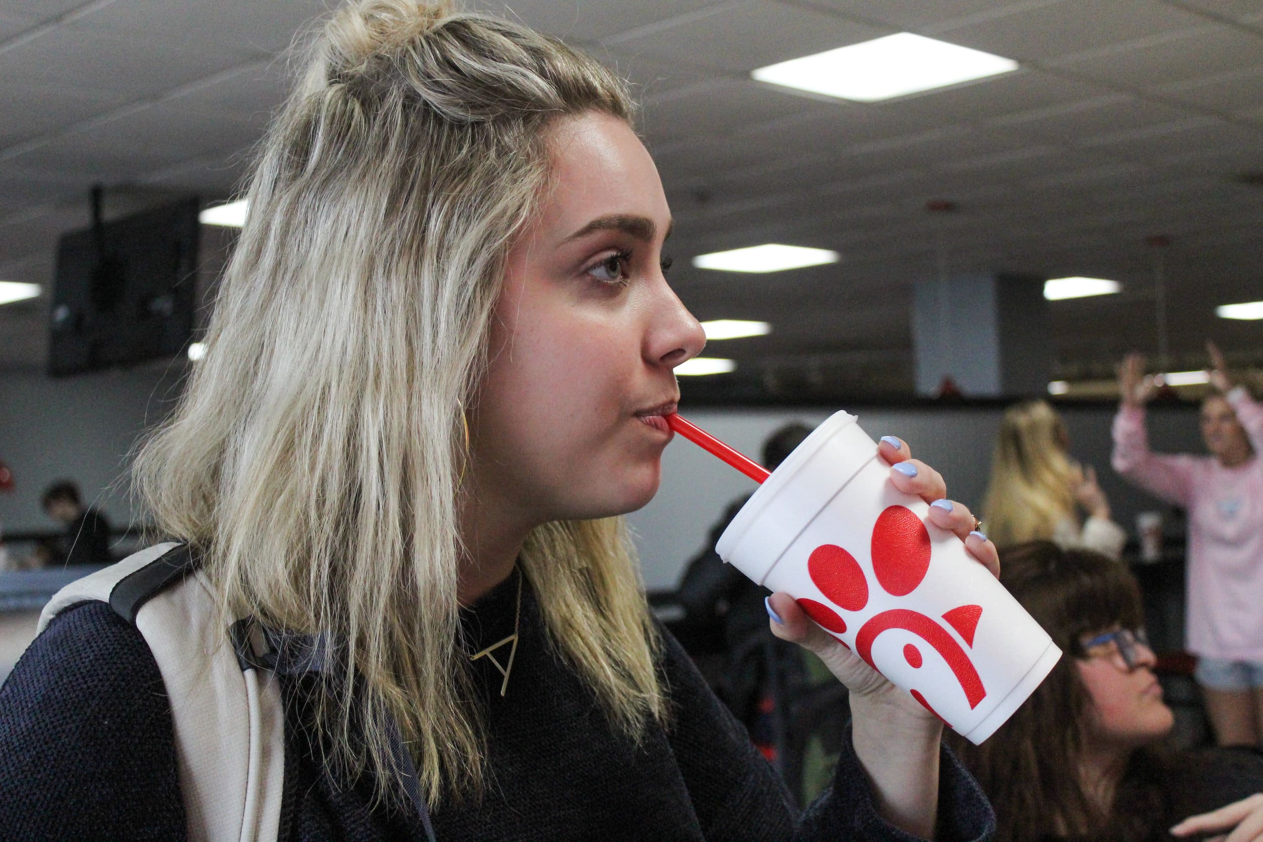 Freshman, Abby Swindal, waits in line for her lunch at Chick-fil-A.
