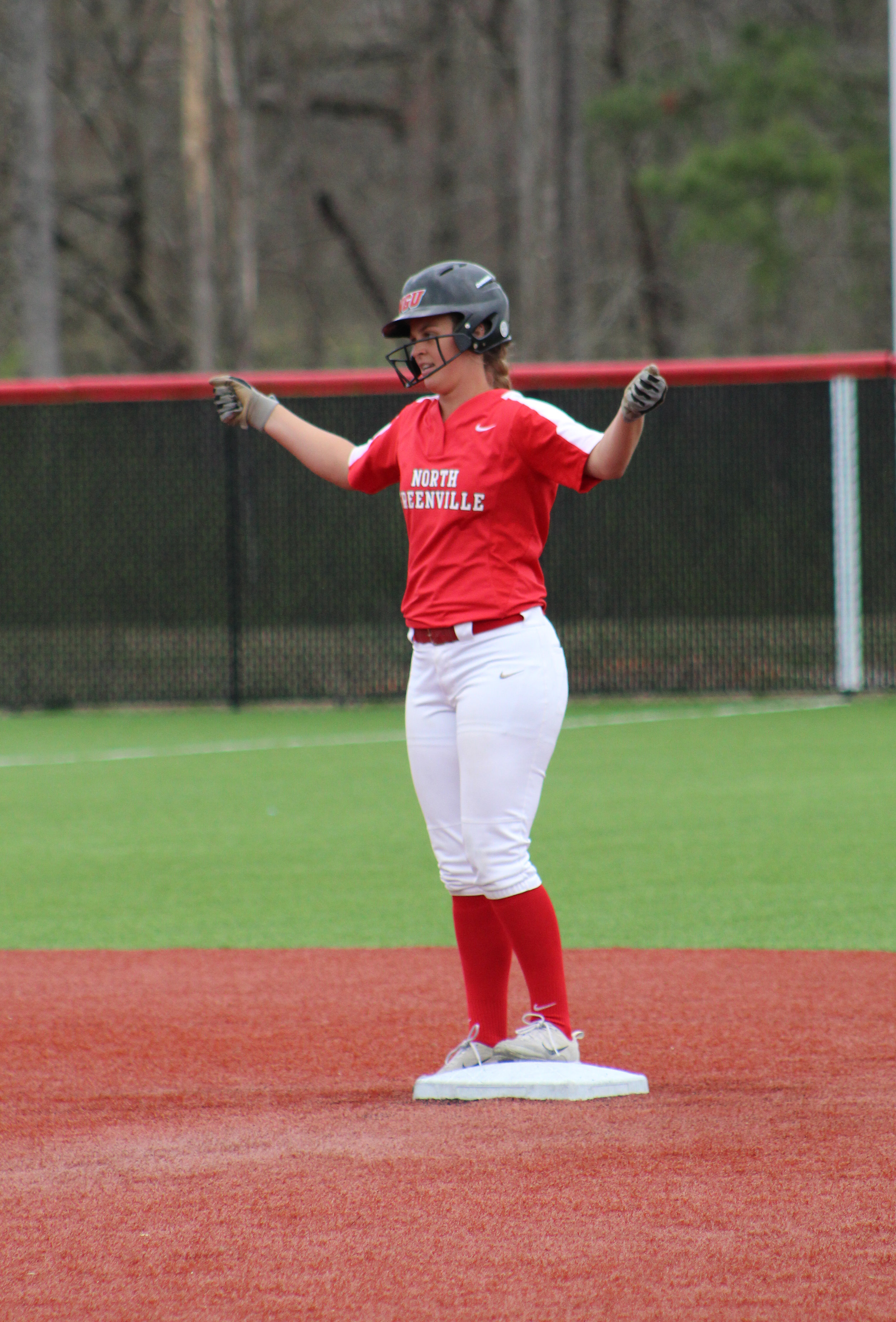 Sophomore, Brooklyn Stone, 4, celebrates her double with a shimmy.