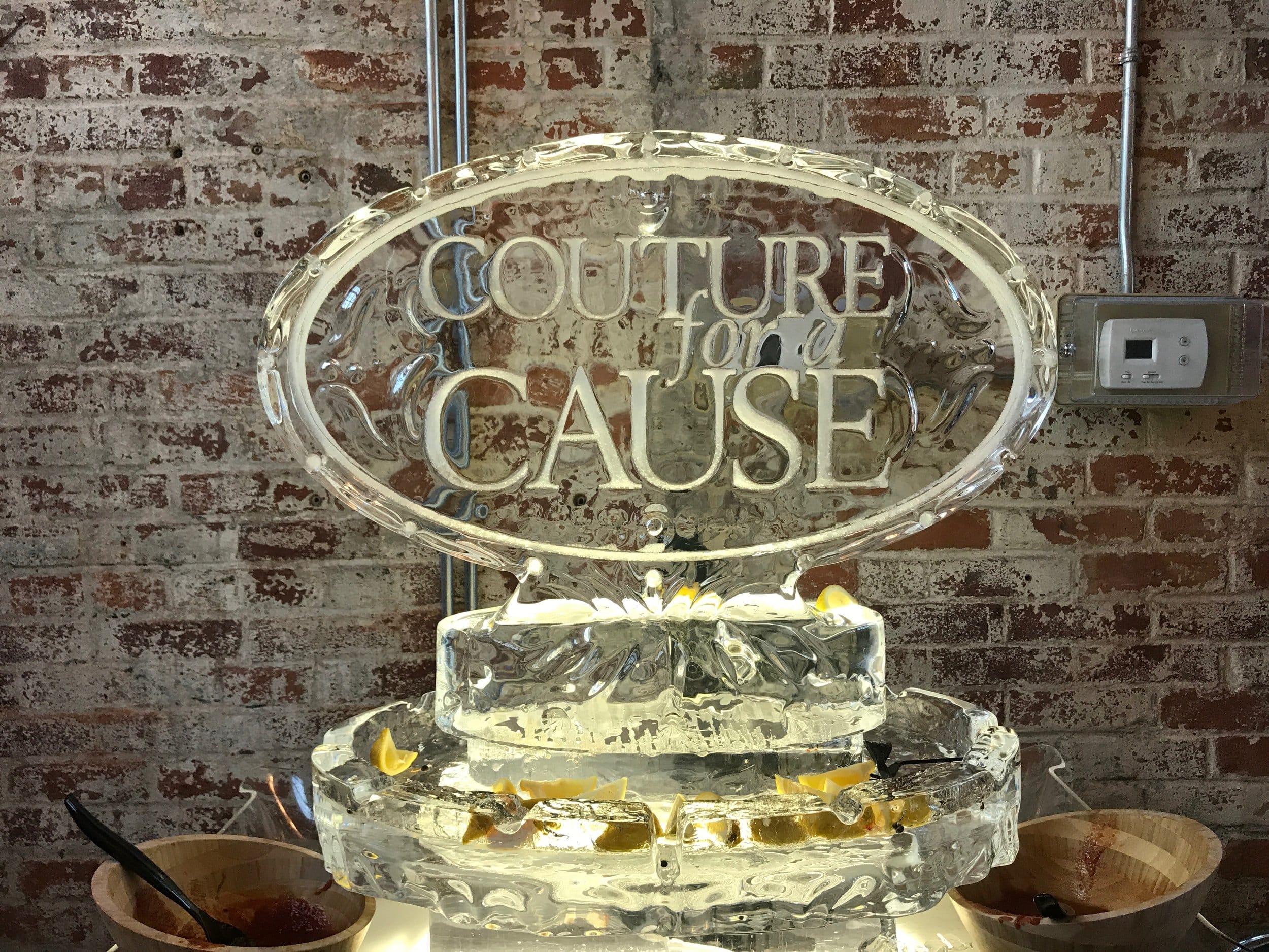 An ice sculpture made with the logo for the event.&nbsp;