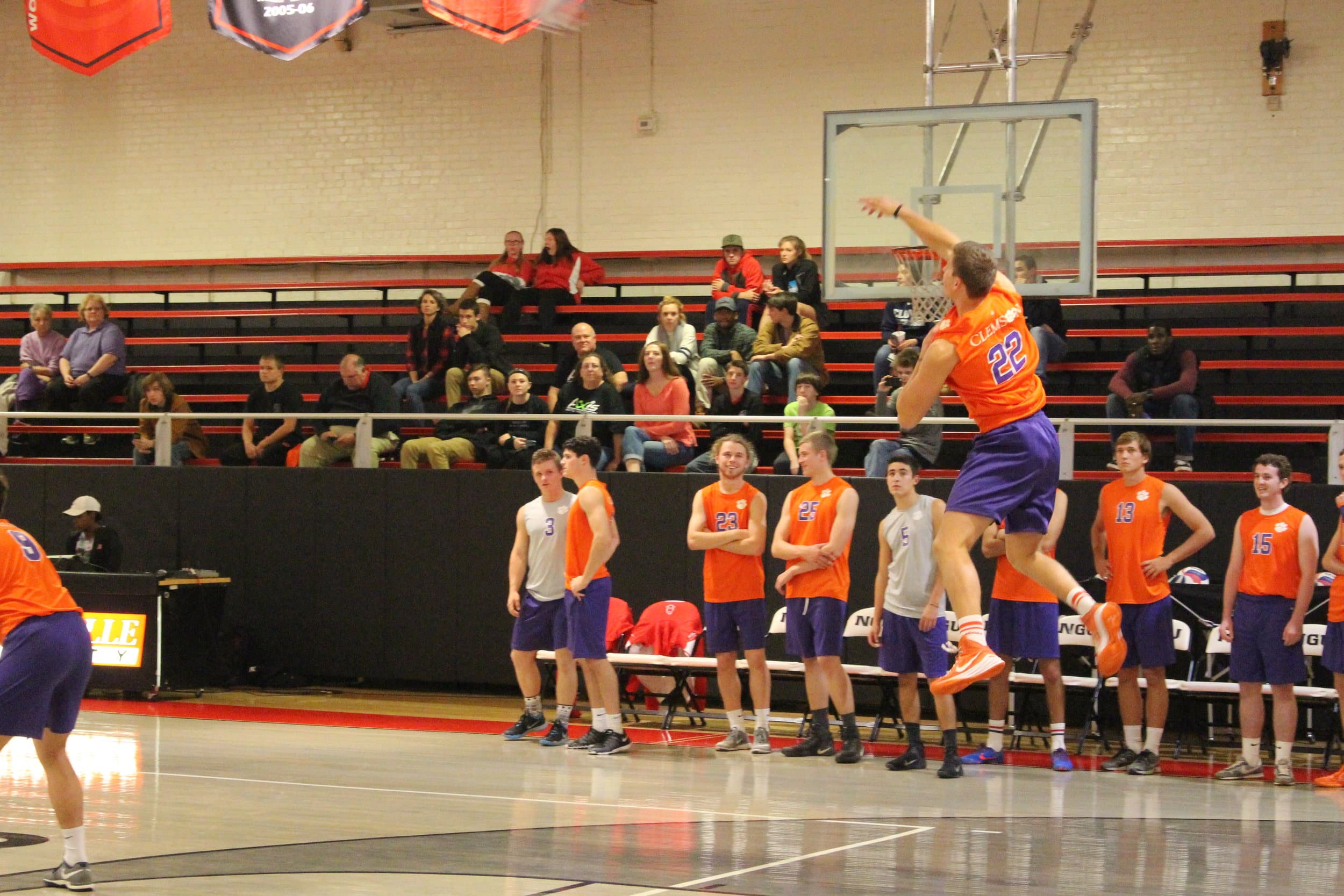  A Clemson player serves up the volleyball with some impressive hops.&nbsp; 