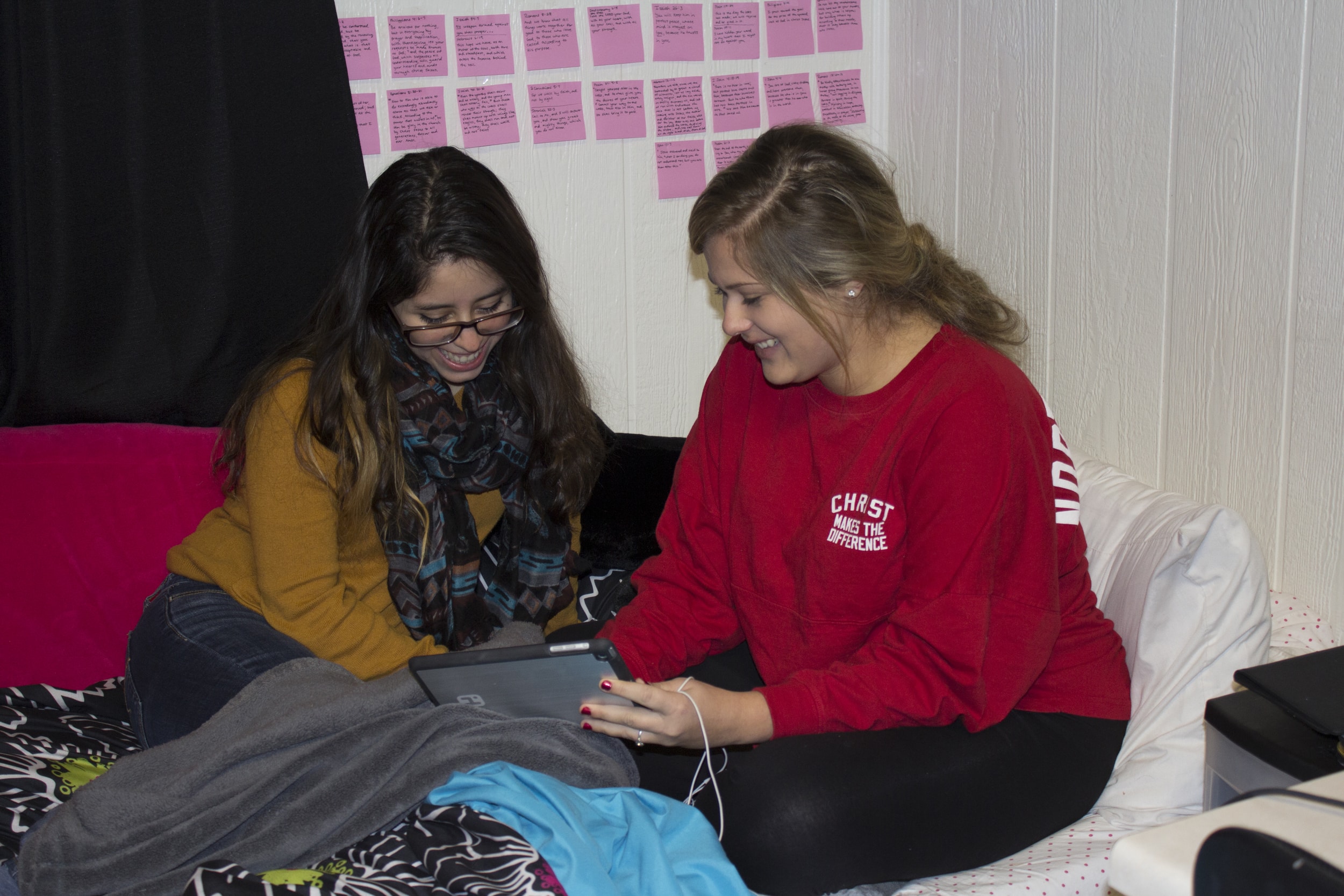  Suit mates Sophia Colmenares and Rachael Cooper enjoy the open dorm night by relaxing in the room.&nbsp; 