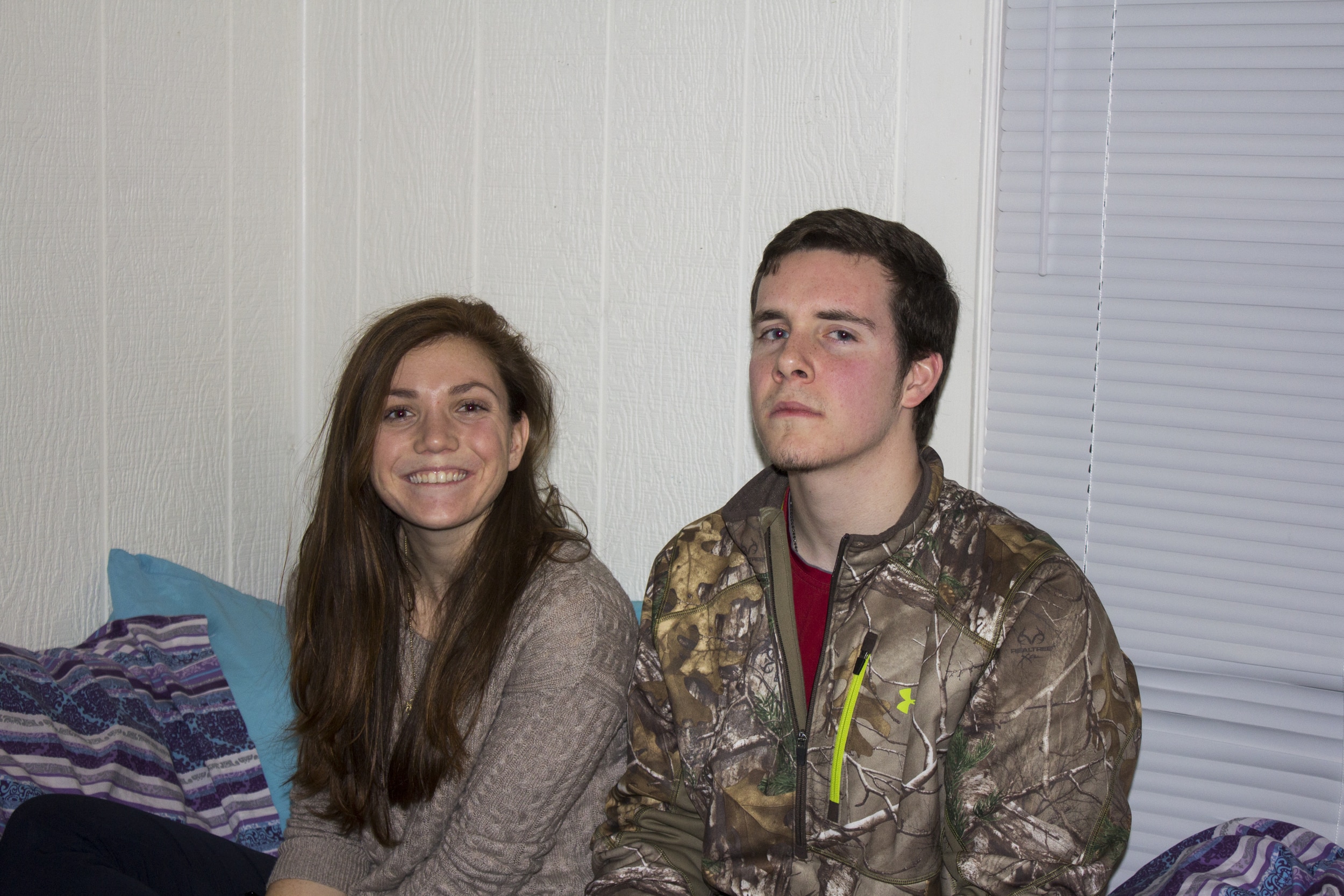  Devin Worth and Matthew Martin enjoy the ability to escape the cold and relax and chat in Worth's room during open dorms. 