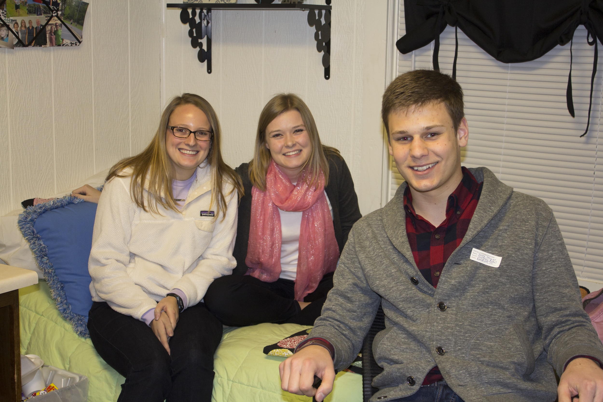  Derek Gahman, Courtney Arndt and Sally Earle drop the work and laughter for a quick picture during open dorms.&nbsp; 