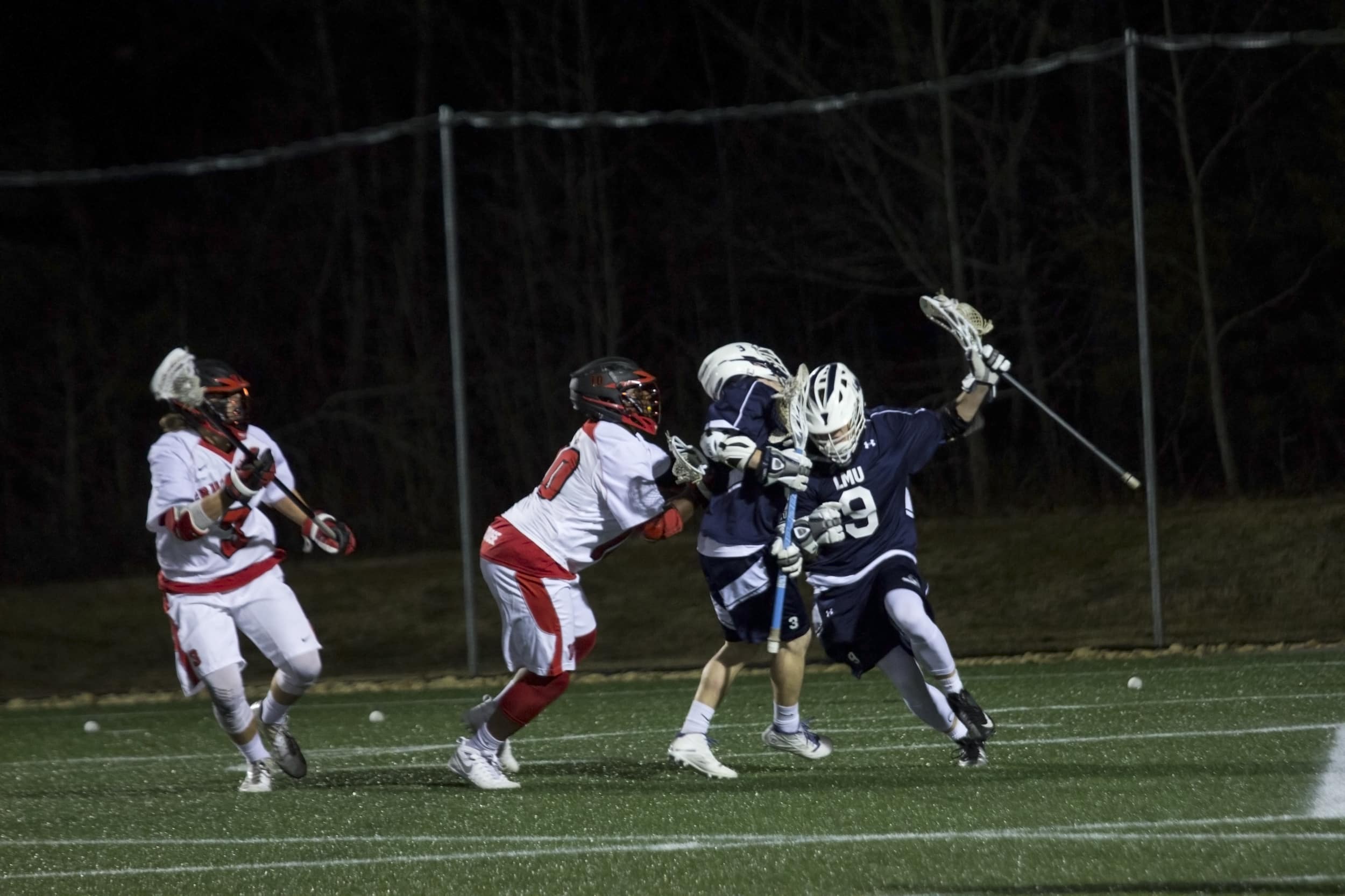  Bell aggressively fights to stop his opponent from gaining ground past midfield.&nbsp; 