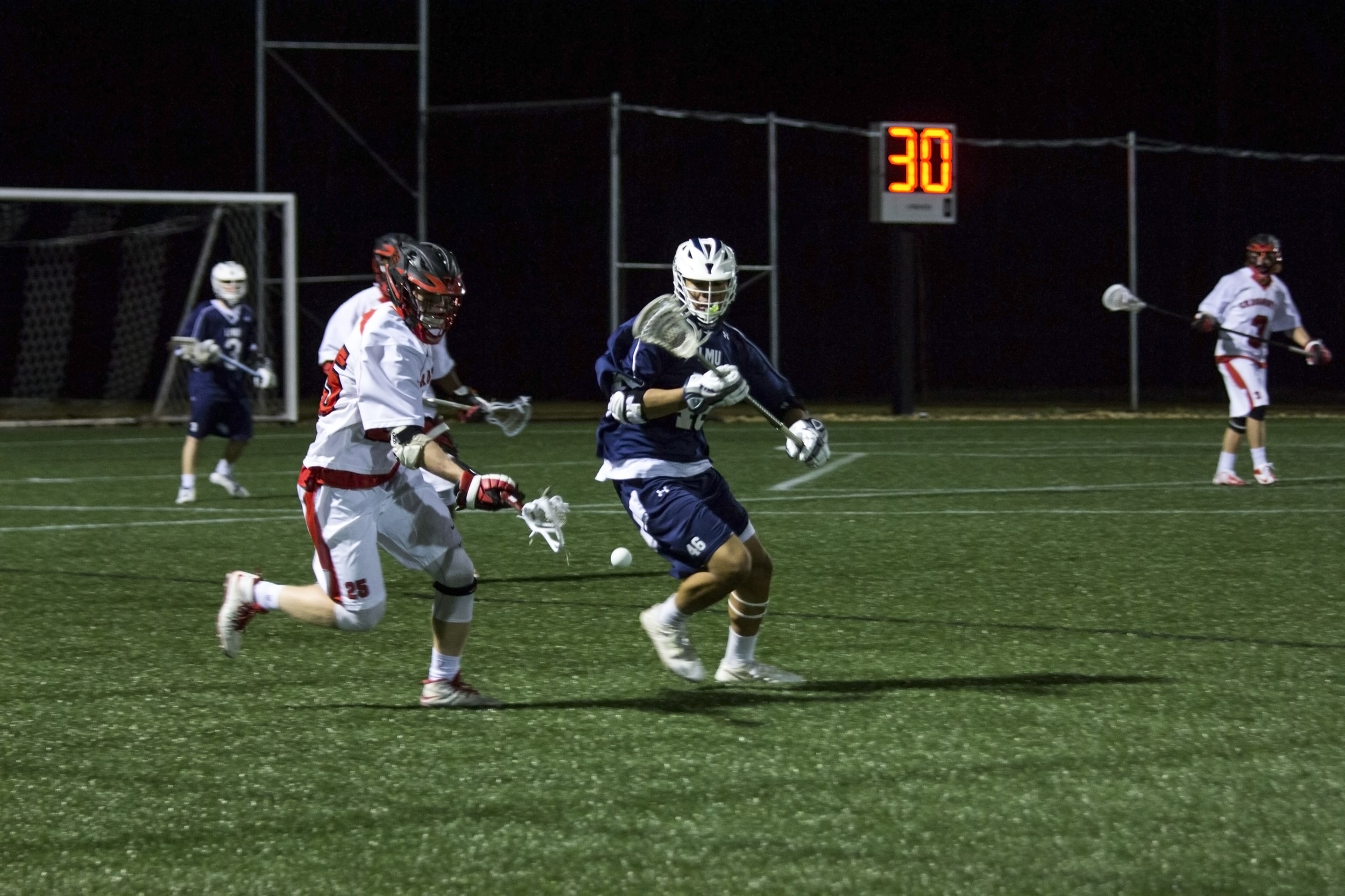  Randolph sprints towards the free ball to gain possession for his team.&nbsp; 