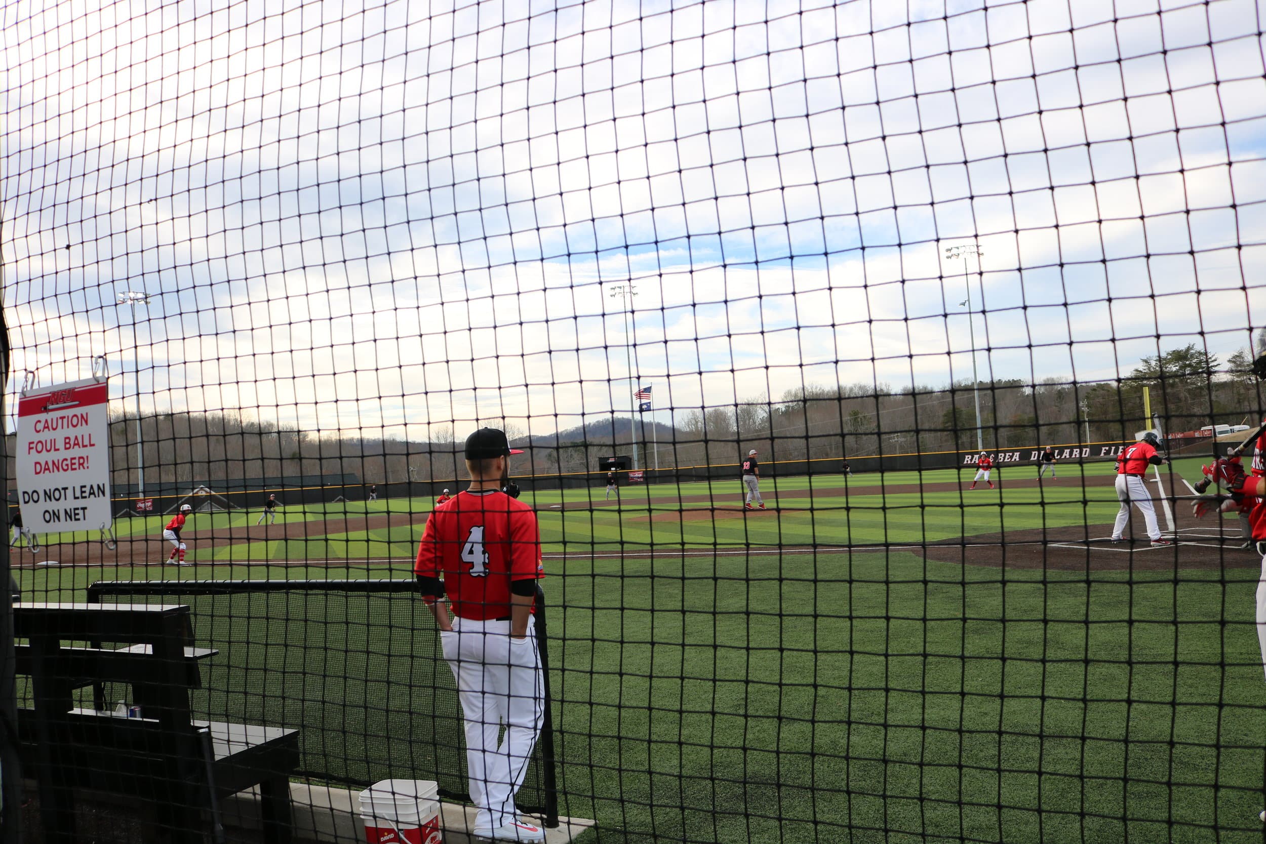 Junior Michael Neustifter (7), gets ready for the pitch, with bases loaded, while Freshman Palmer Sapp (4), watches Neustifter.