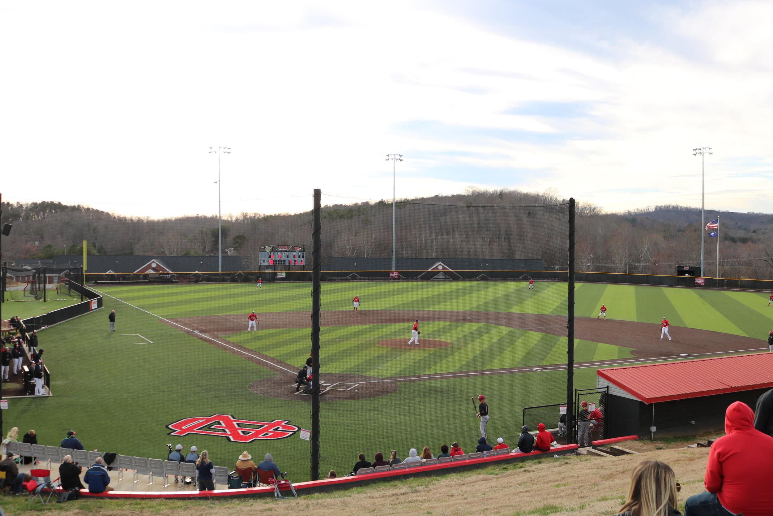 The Crusaders warm up on the field at the top of the 3rd inning.