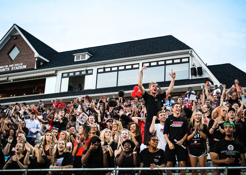 Fans in the stands lead to football champs- Read how school spirit has shaped the season