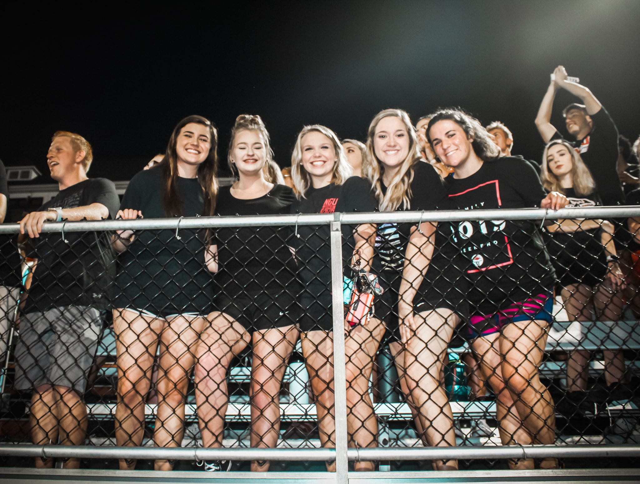 Jacob Morris, Jessica Gasque, Kelsey Truluch, Mary Collins, Nicole Pollard, and Mandie Trainer hanging out in the student section.