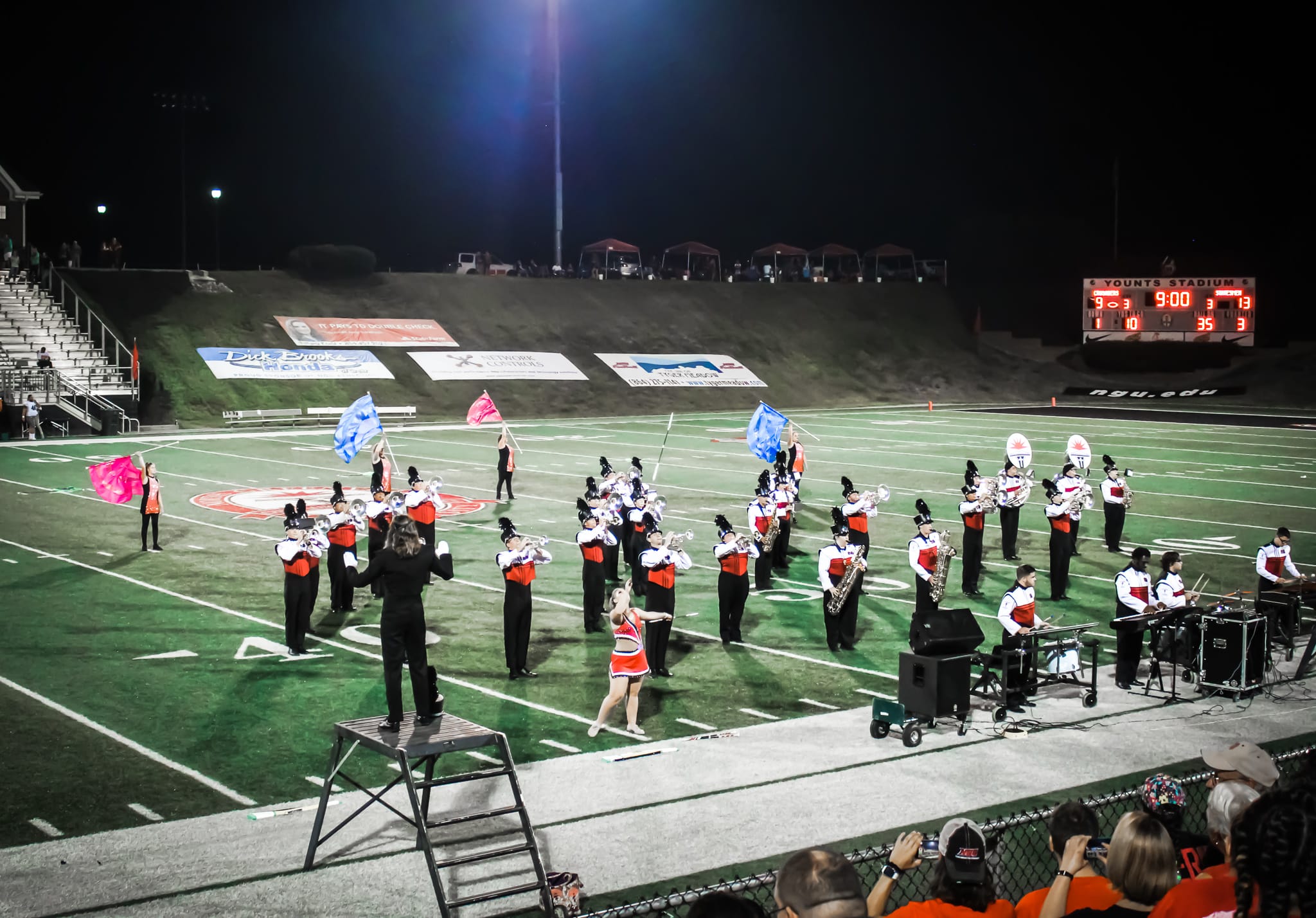 Band members perform their show at halftime.