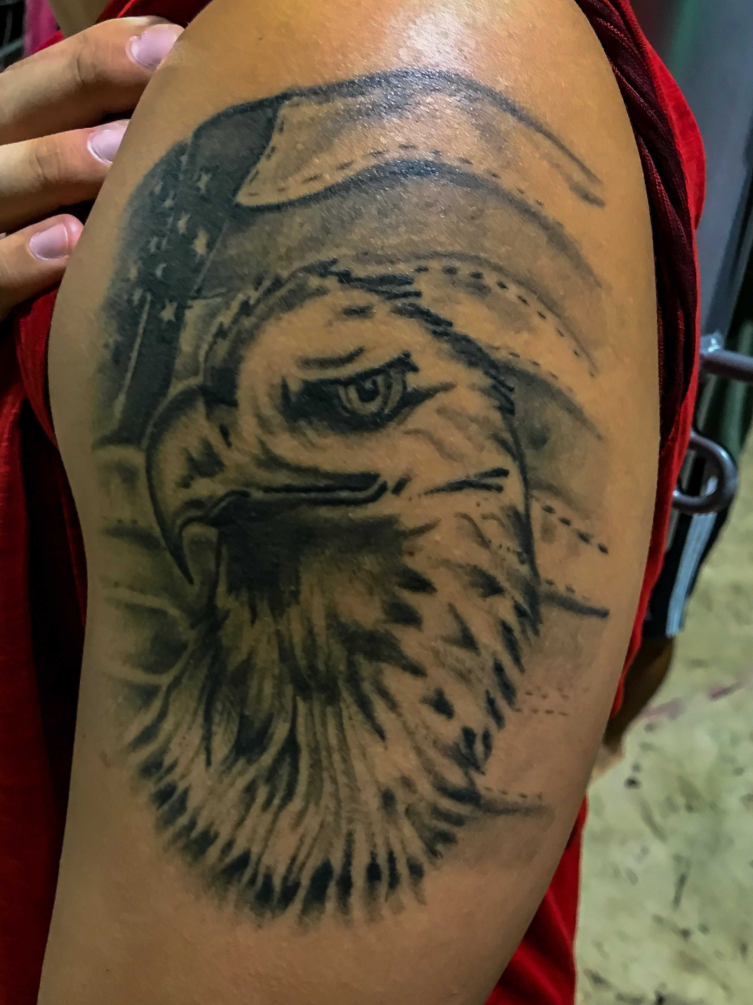 This is one of Ian Baileys tattoos. It is an eagle head in front of the American flag. This symbolizes his character and passion. Bailey likes to be alone but has the character to protect all. Which leads into the American flag which symbolizes pow