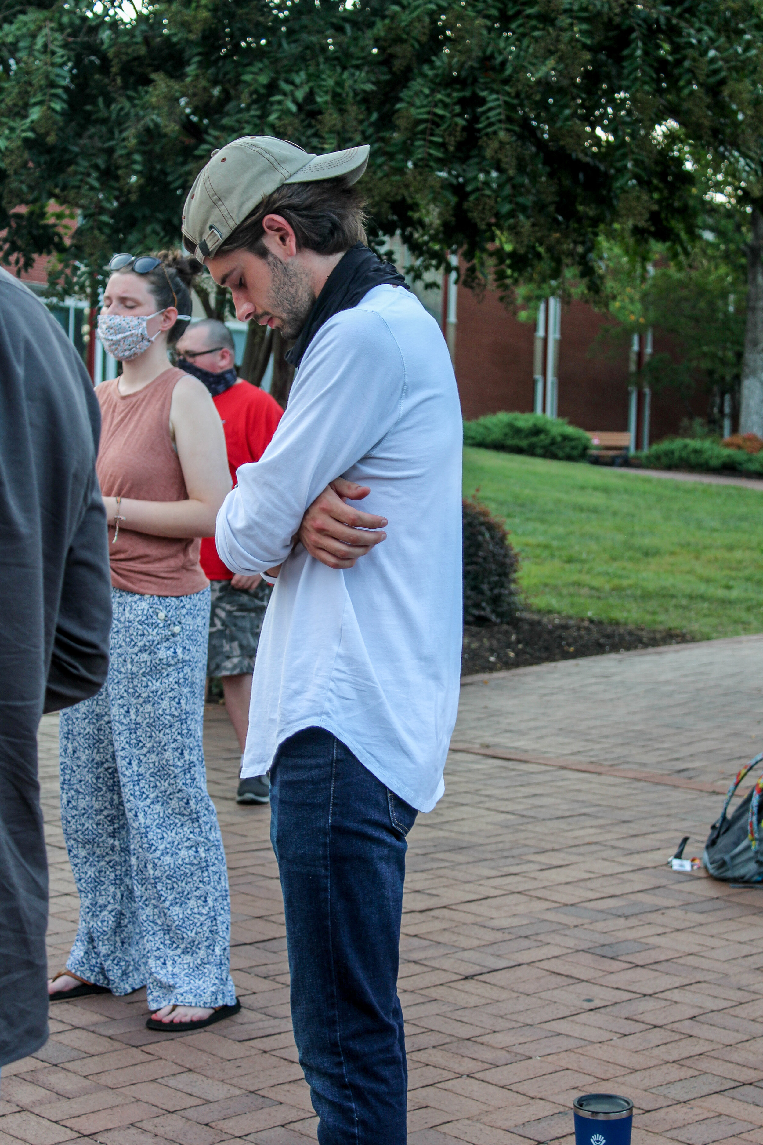Austin Erhardt, Christian studies major, bowed in prayer. Austin leads the prayer team for BCM Leadership, and thus organizes and leads this pre-service gathering every Thursday.