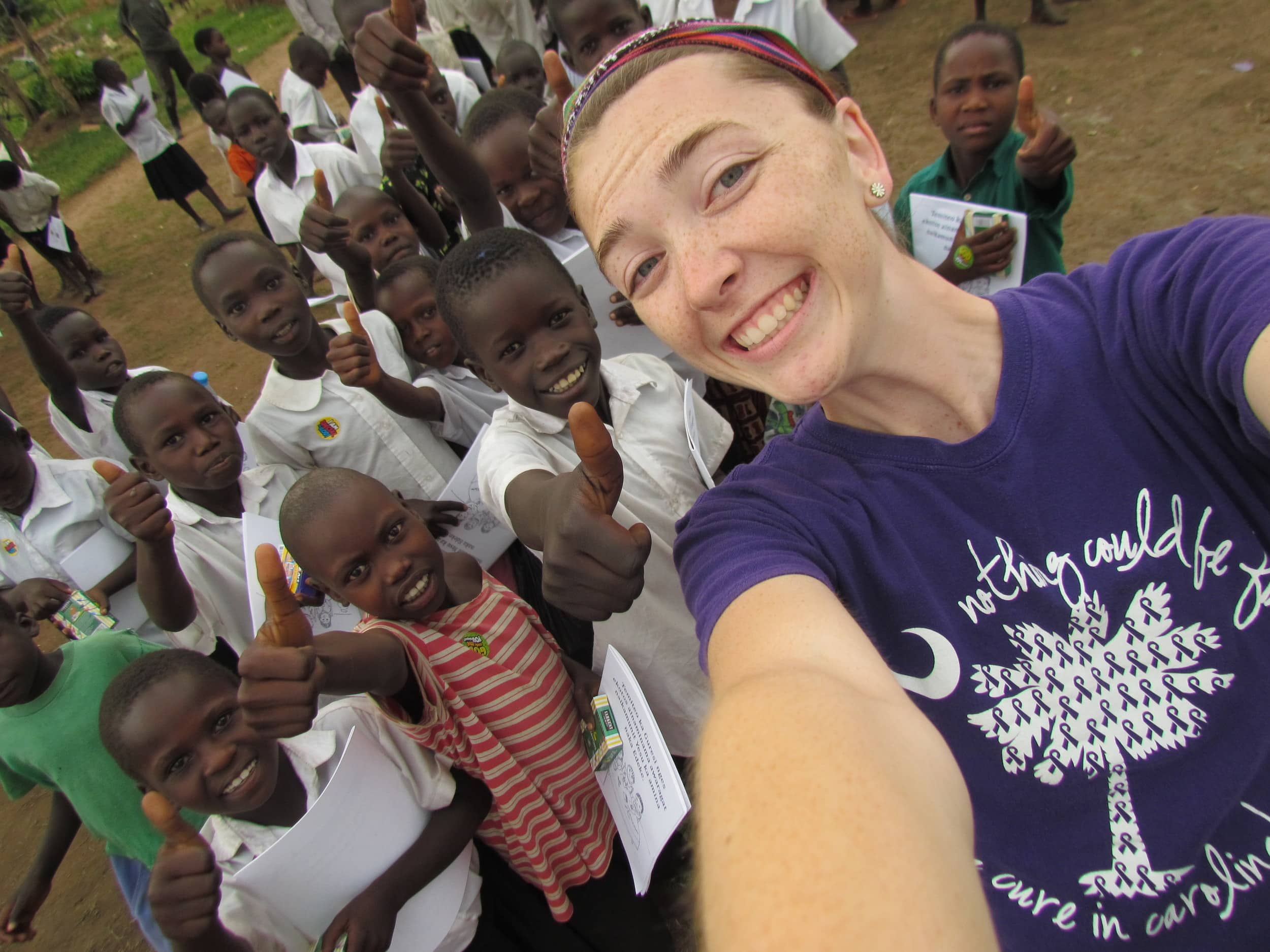  Courtney takes a selfie with her new Ugandan friends. 