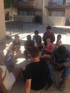  Mandy plays Uno with a group of African refugees, which gave her opportunities to share the Gospel. 