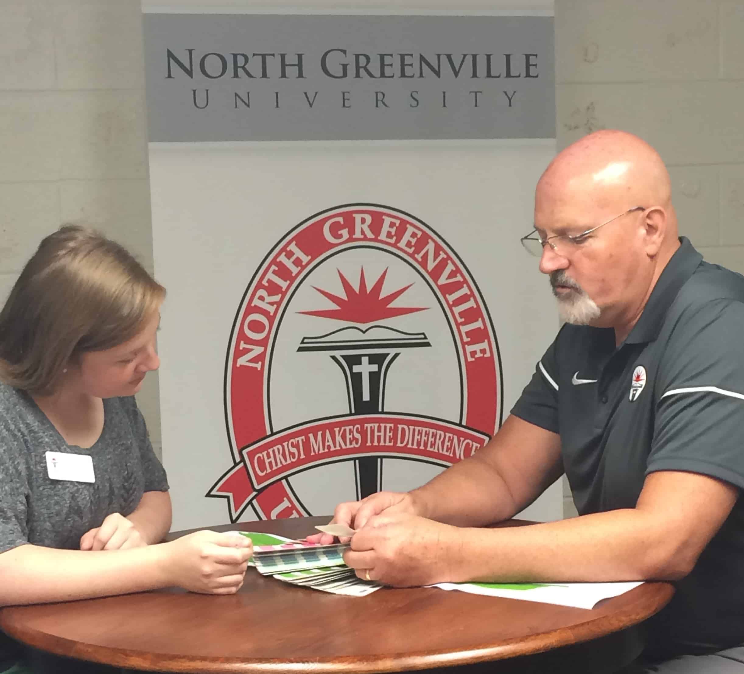 Mary Mahan, a sophomore interdisciplinary studies major, with PrintHub Director Gary Southern