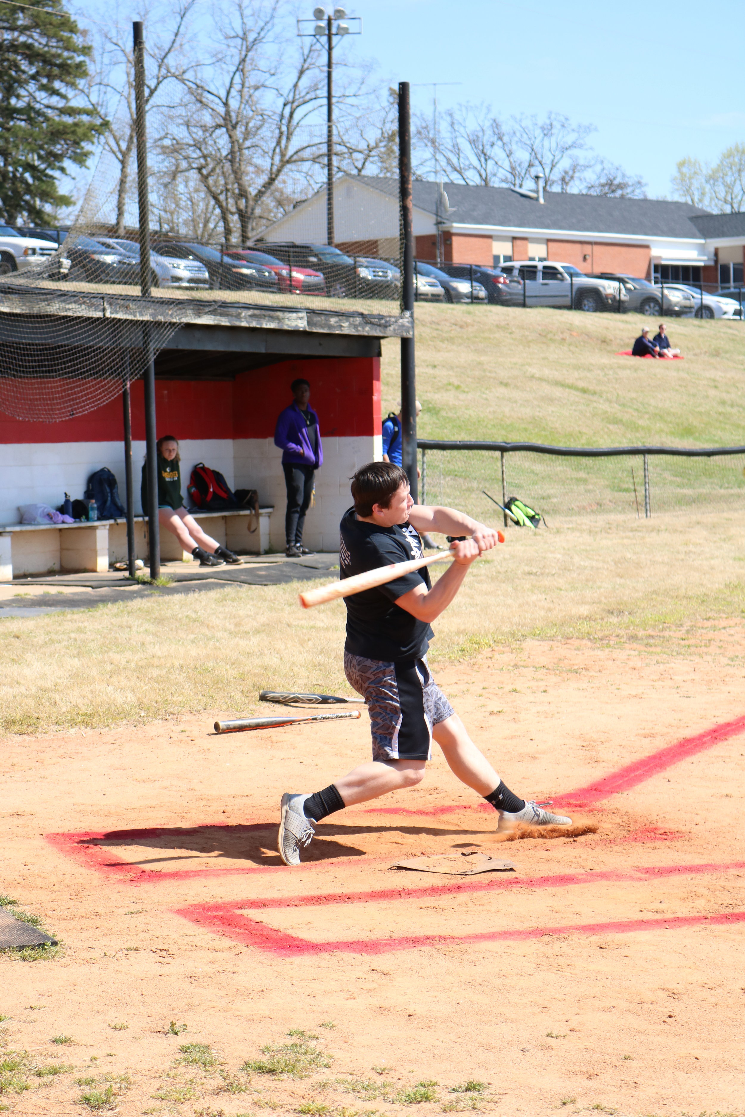 Freshman Jesse Haack takes a swing and ends up hitting a home run for their team BATsheba during the bottom of the 2nd inning.