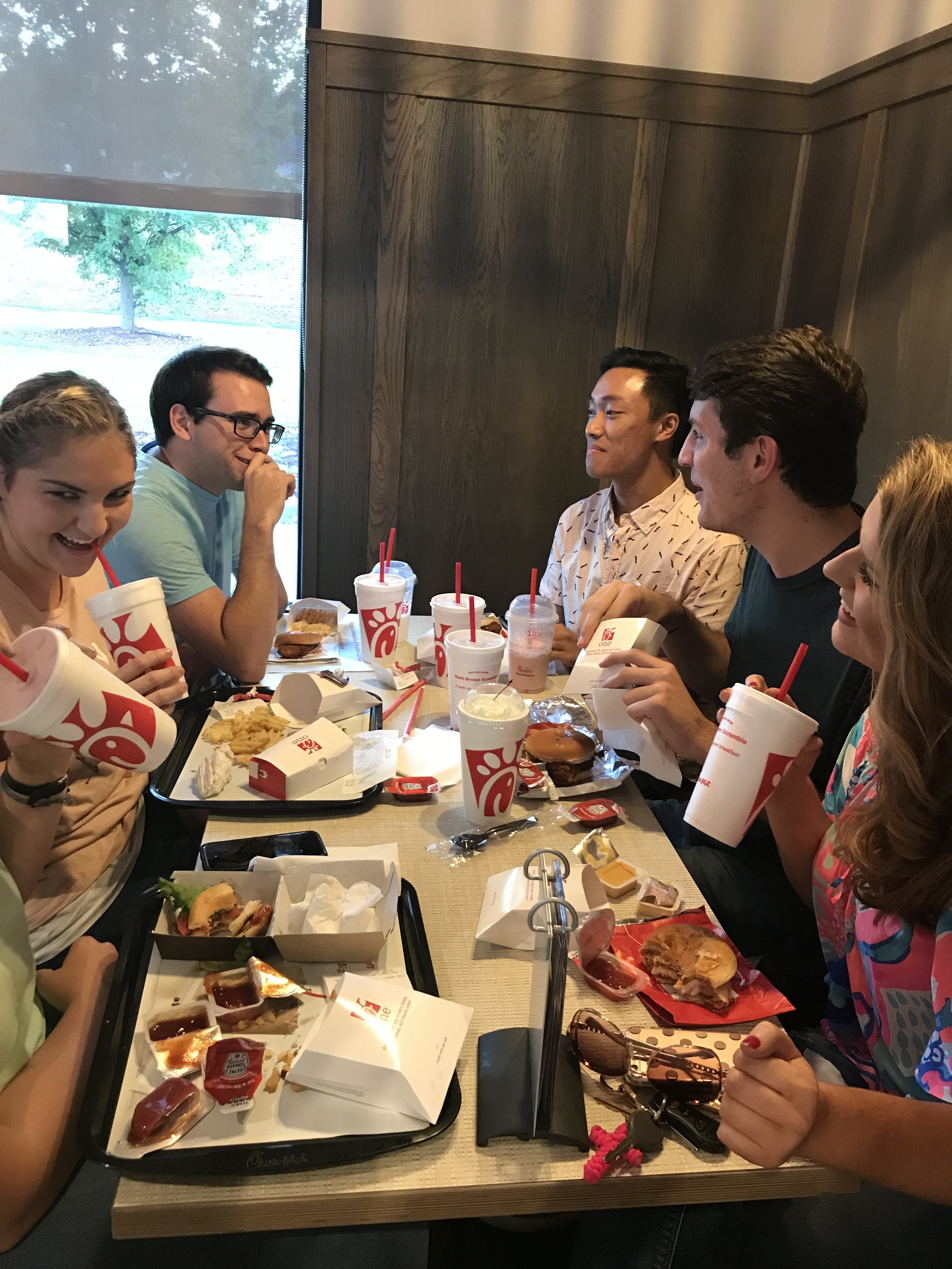 Savannah Hovis (junior), Clayton Caldwell (junior), Adam Kelly (sophomore), Clay Webb (senior)&nbsp;and Alexandra McNider (junior) gather in fellowship as they dine at the new Chik-Fil-A.&nbsp;