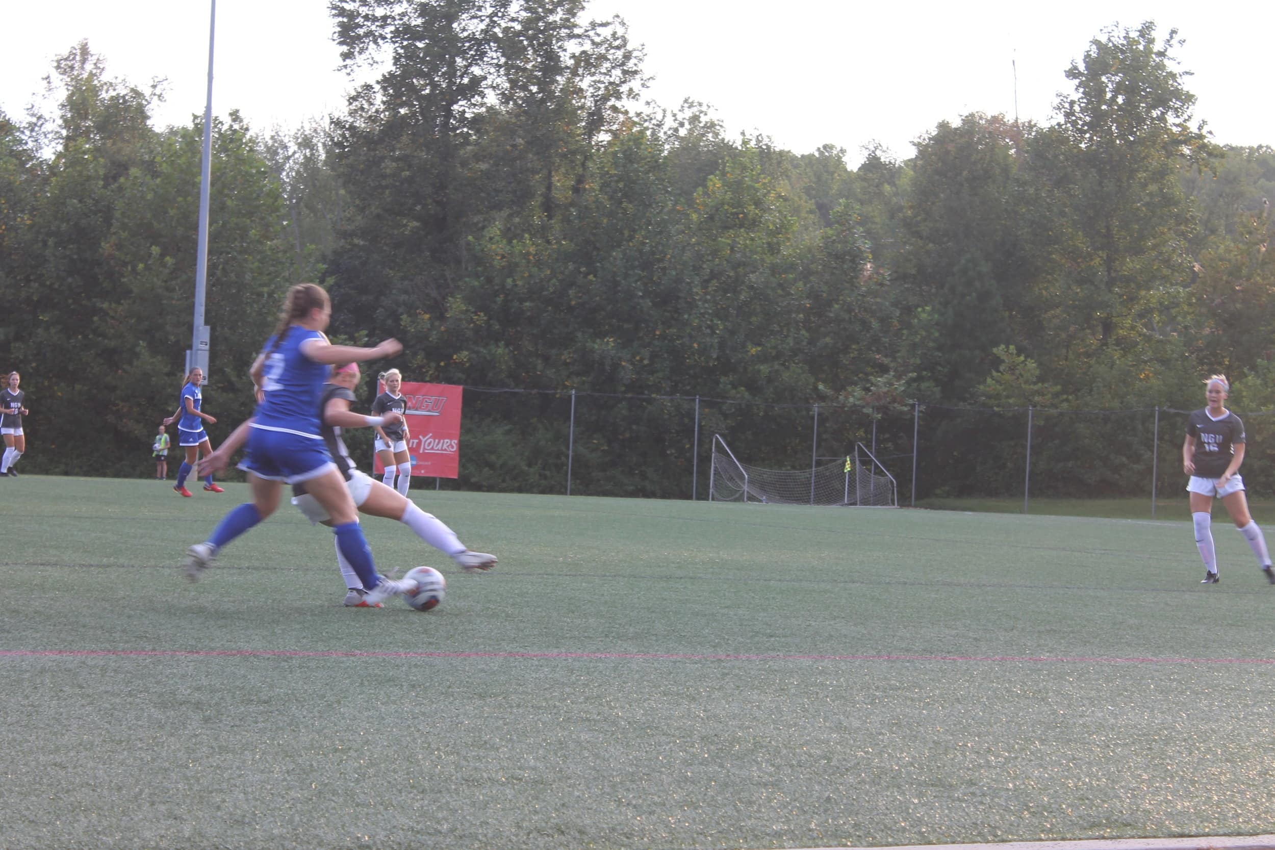 NGUs number six, Camryn Pagliaro attempting to cut off the landers attacker, Kylee Eppl to get the ball.