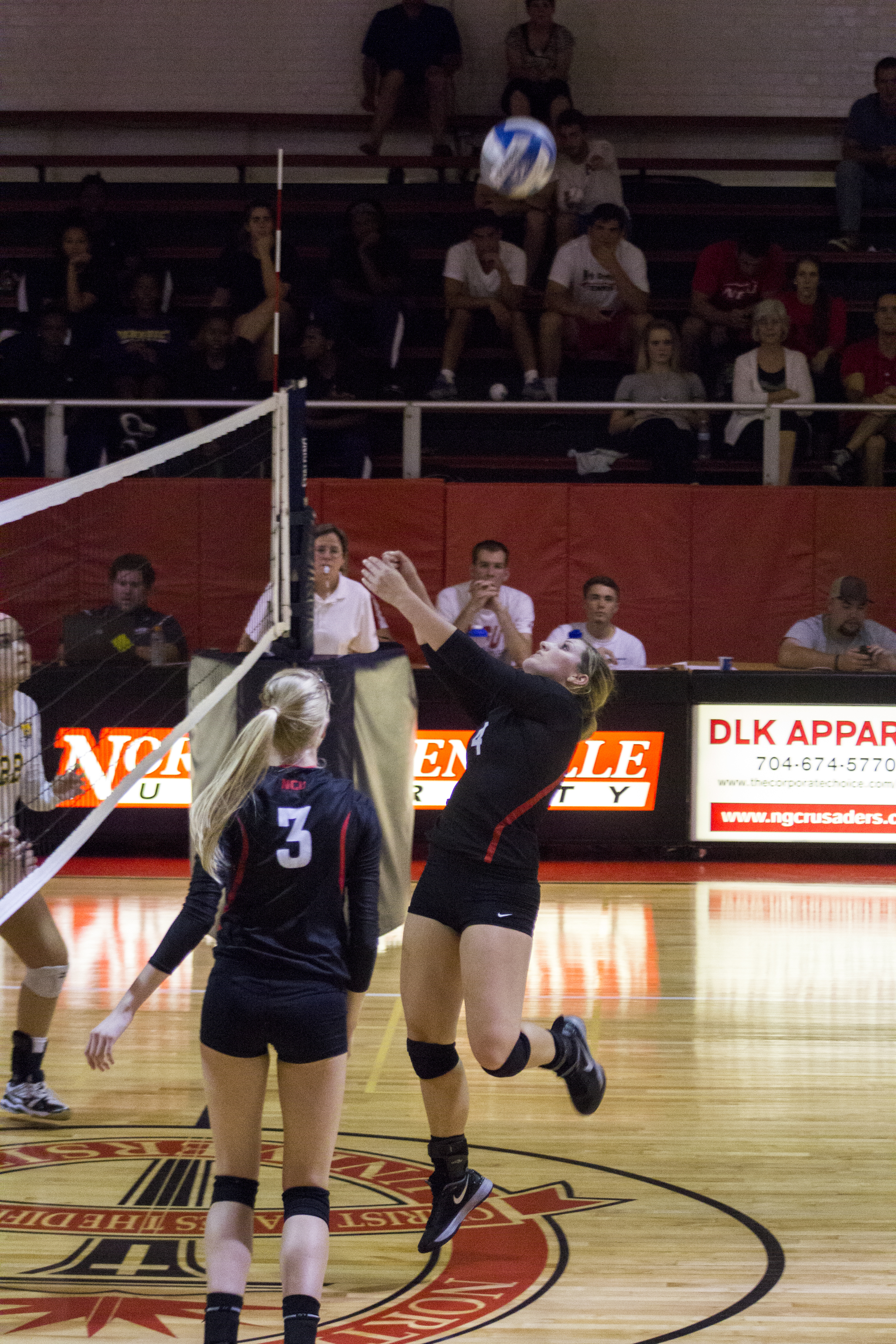  Sophomore Ashlyn Wilkinson bumps the ball backwards to her teammate. 