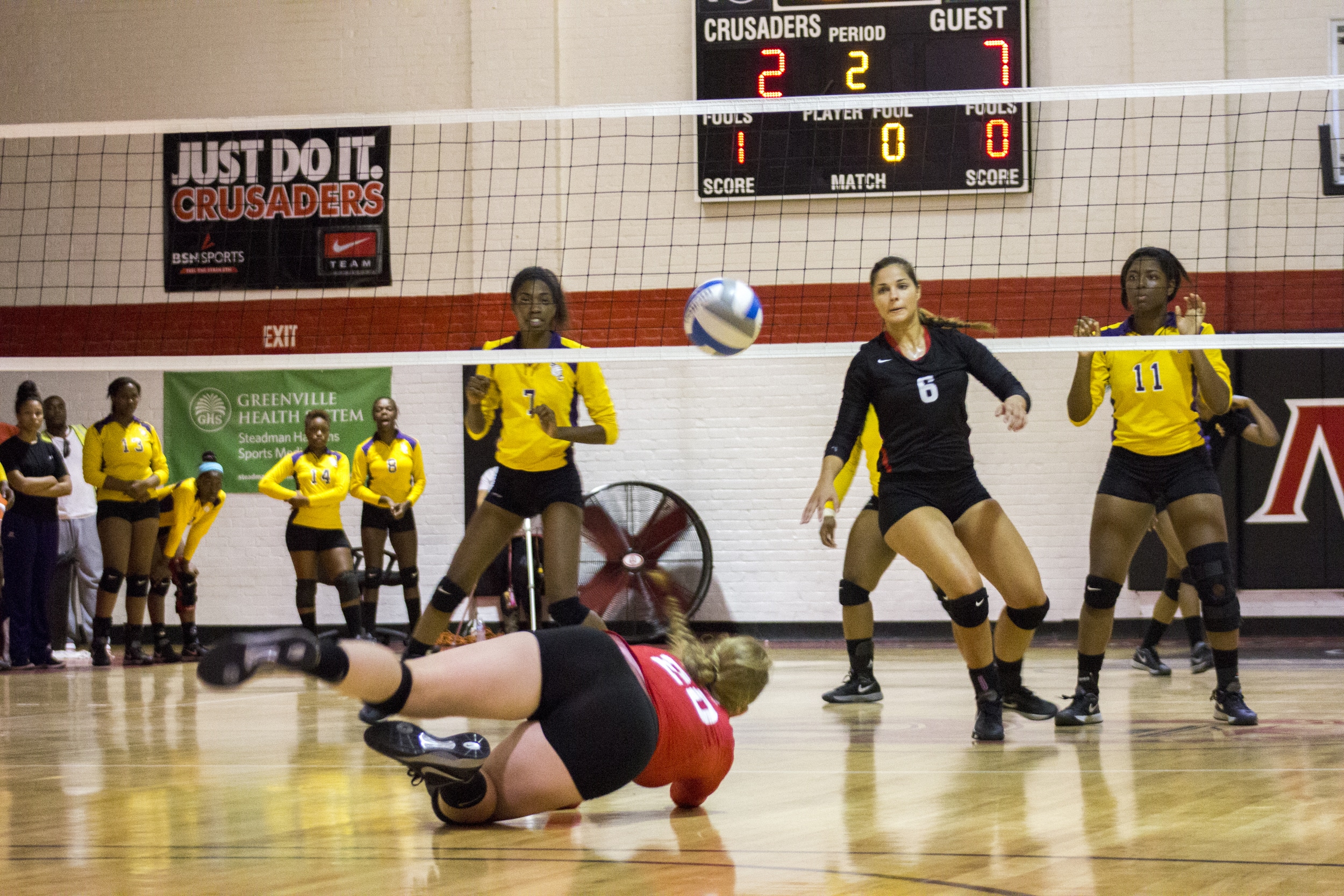  Junior Hannah Lewis dives to save the ball. 