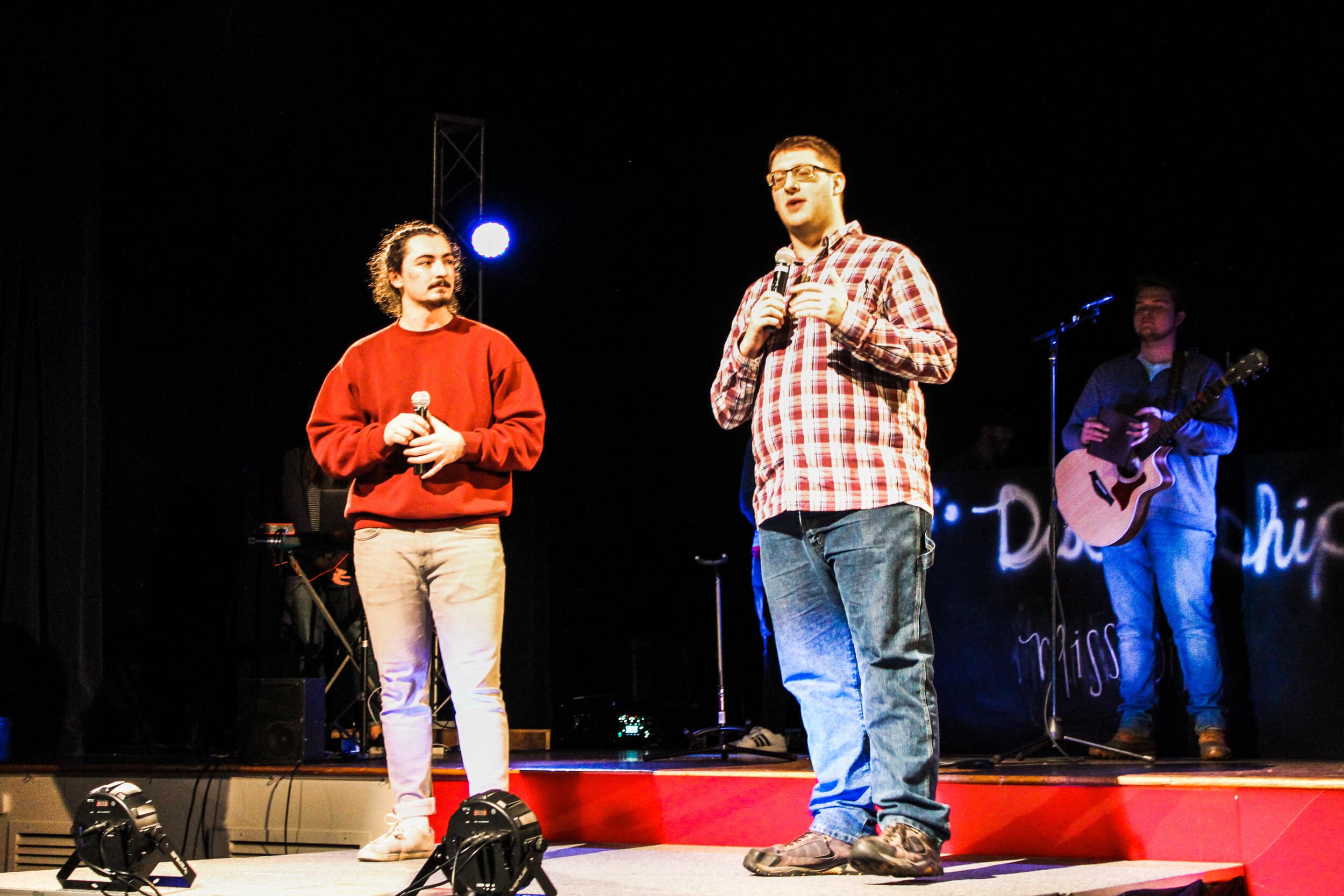 Ethan Pettigrew and Ethan Hyatt giving announcements at BCM.