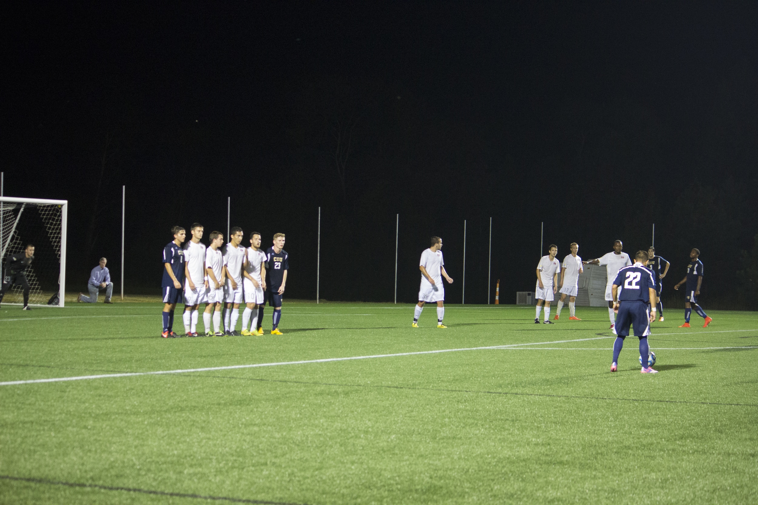  Crusaders form a wall against the Columbia International's&nbsp;free kick.&nbsp; 