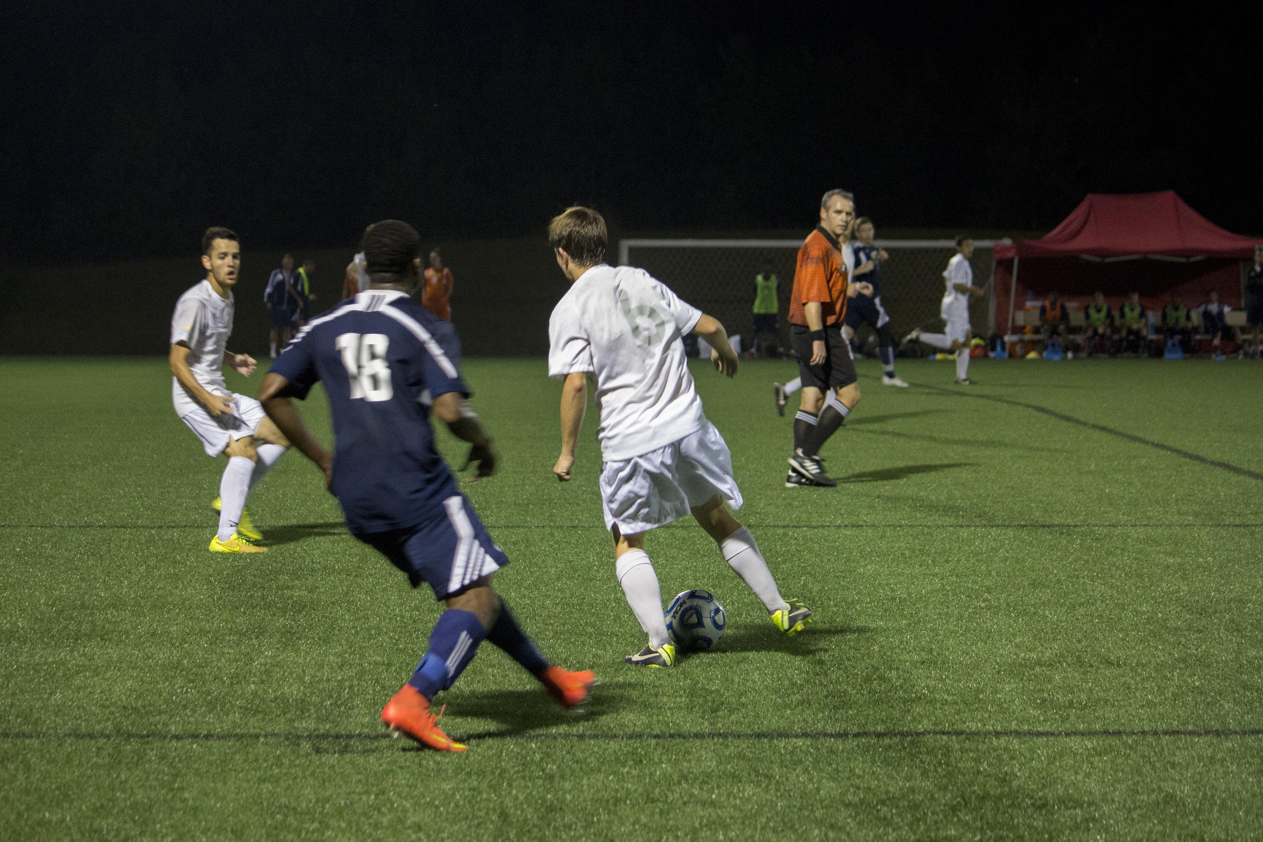  Sophomore Jonny Lind passes the ball to his teammate across the field.&nbsp; 