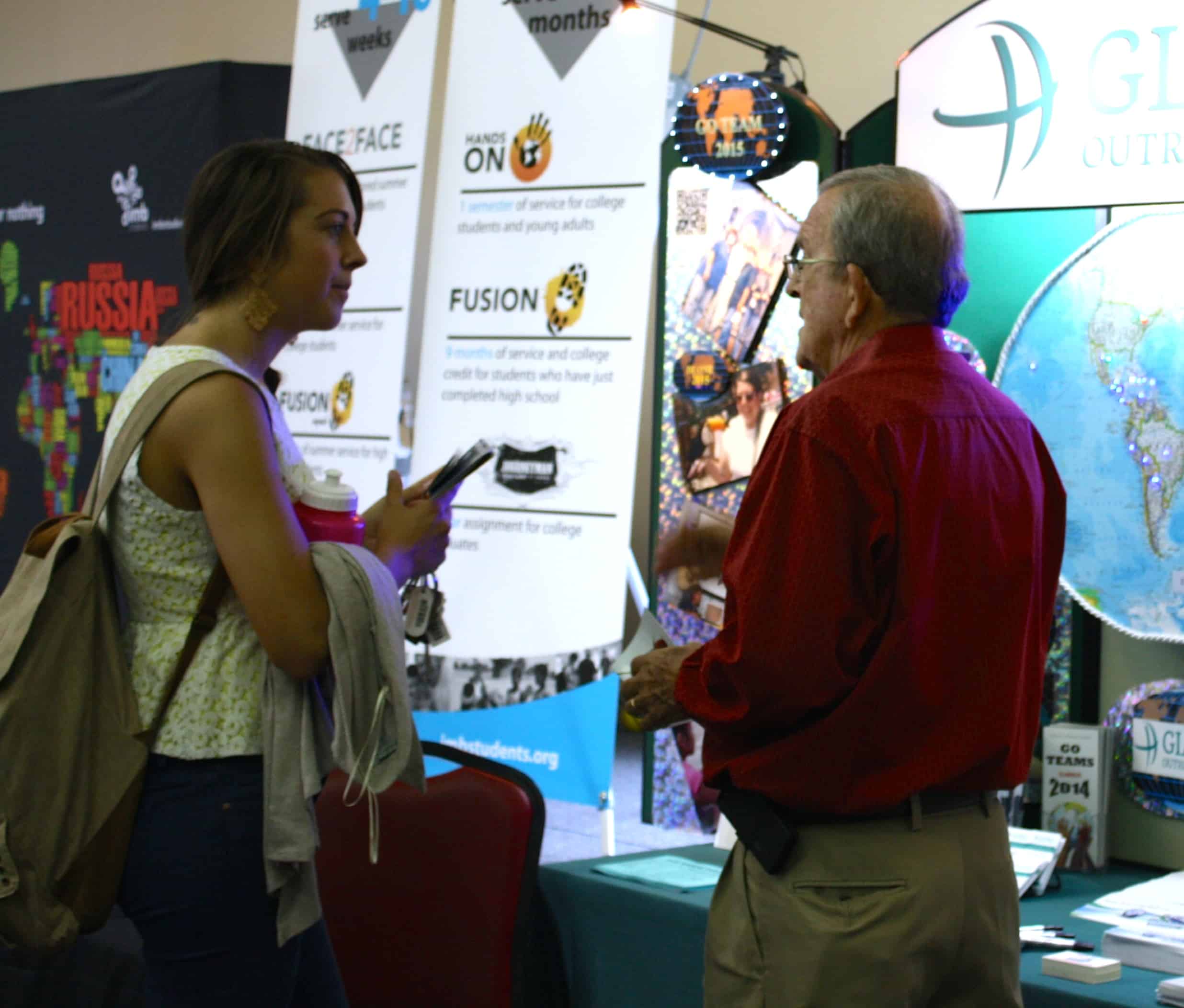  A student inquires about mission opportunities during NGU's global missions week September 8-10. 