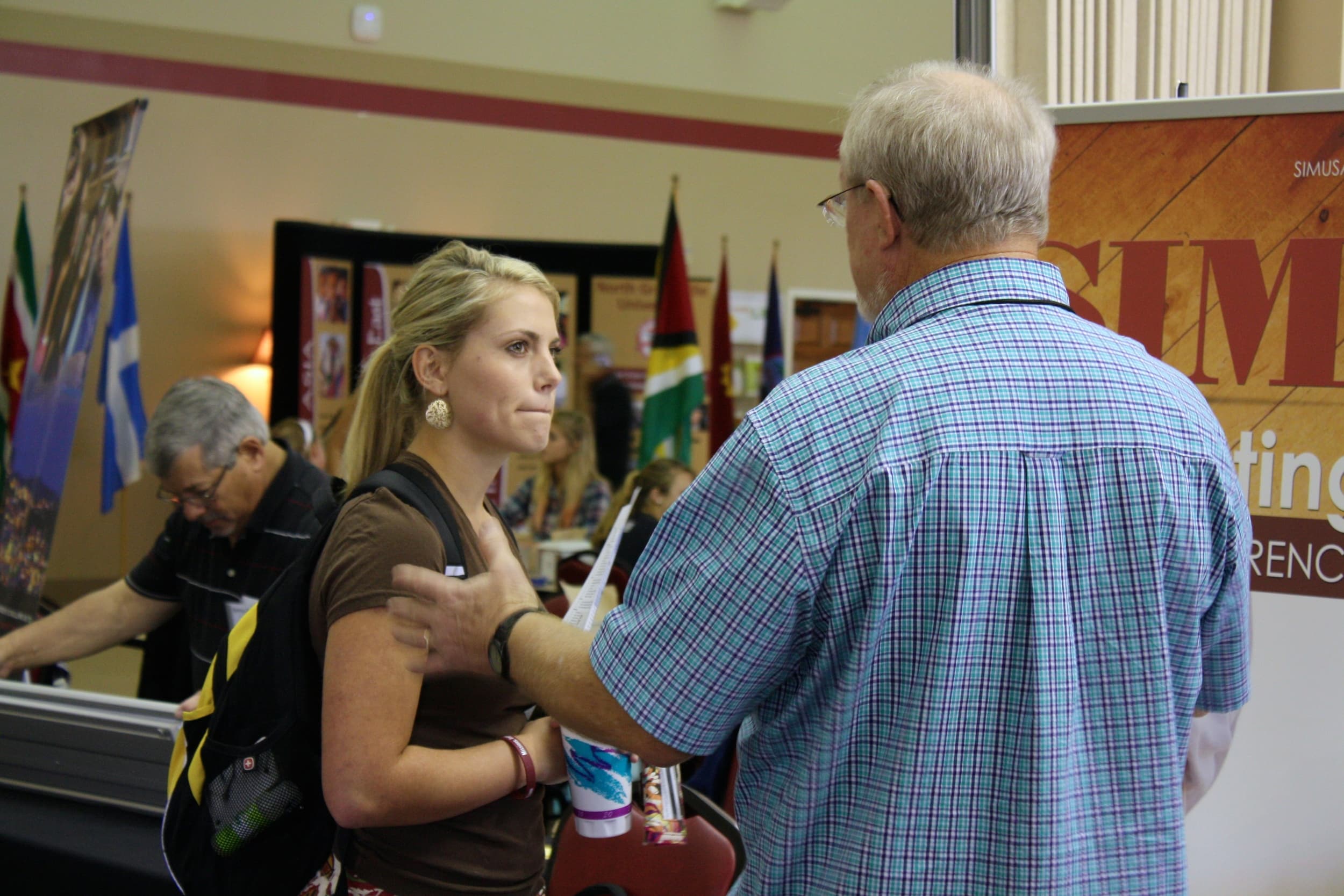  A student intently listens as a missionary explains his ministry during NGU's global missions week September 8-10. 