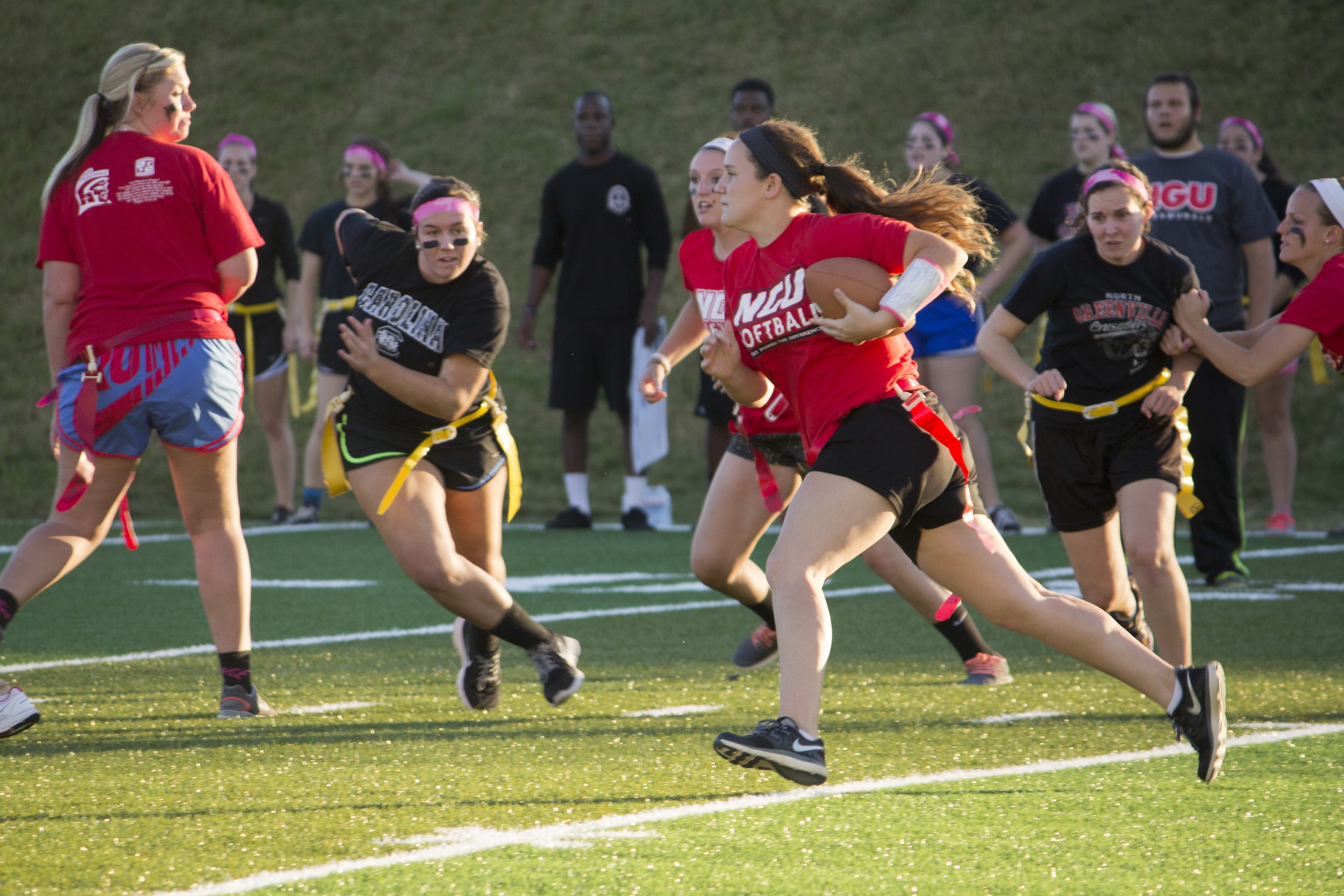  Senior Cassi Carpenter runs down the field in attempts to gain a first down.&nbsp; 