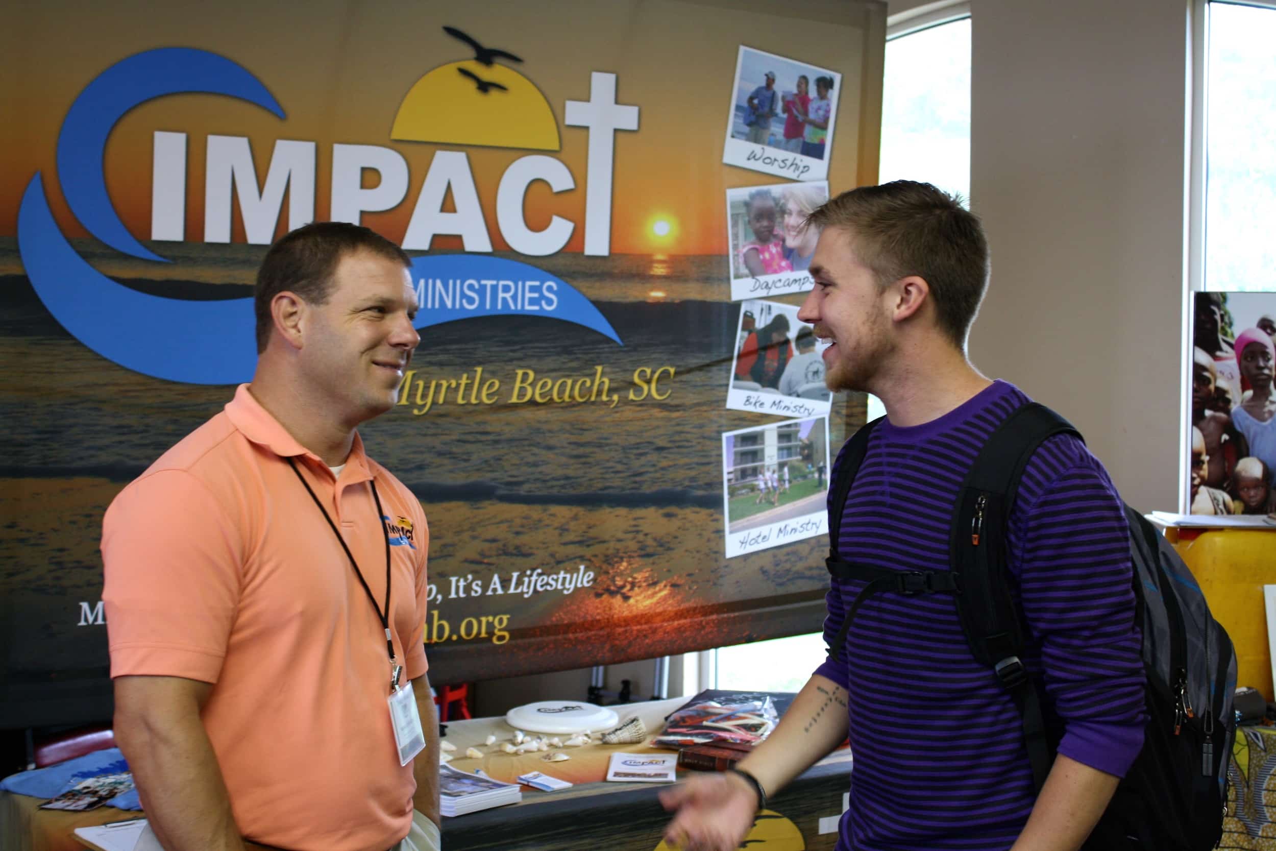  A student and a missionary share stories during NGU's global missions week September 8-10. 