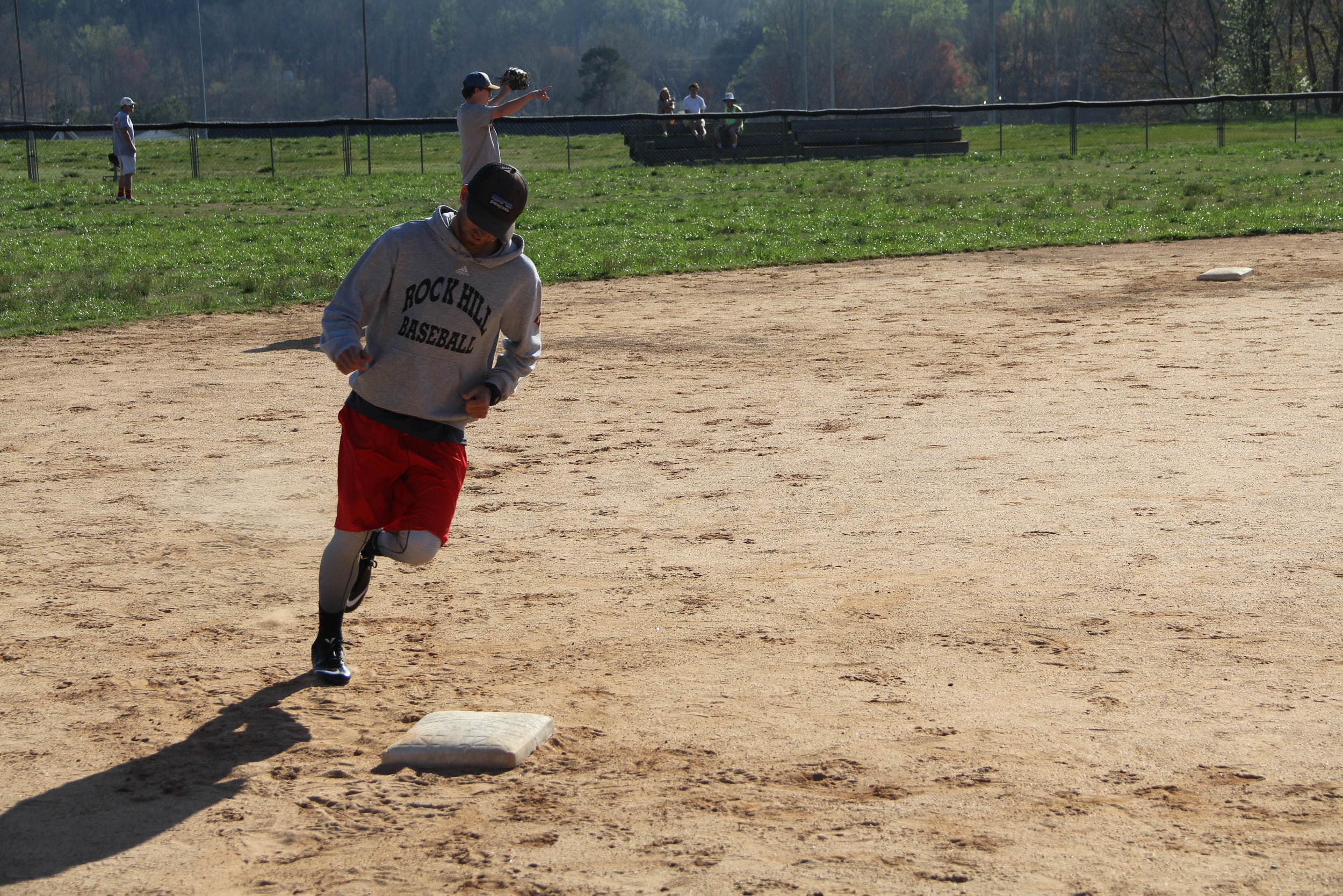  Stewart Hunt jogs around third base.&nbsp; 