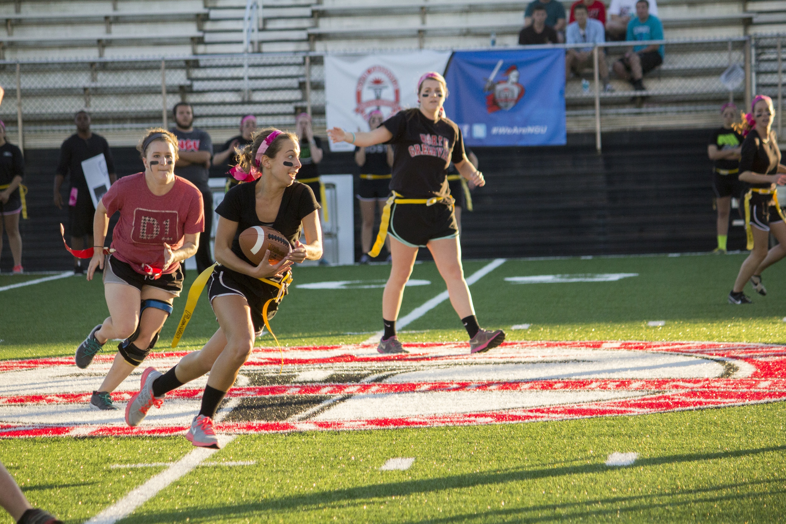  Junior Kayce Beck cradles the ball as she takes off downfield. 