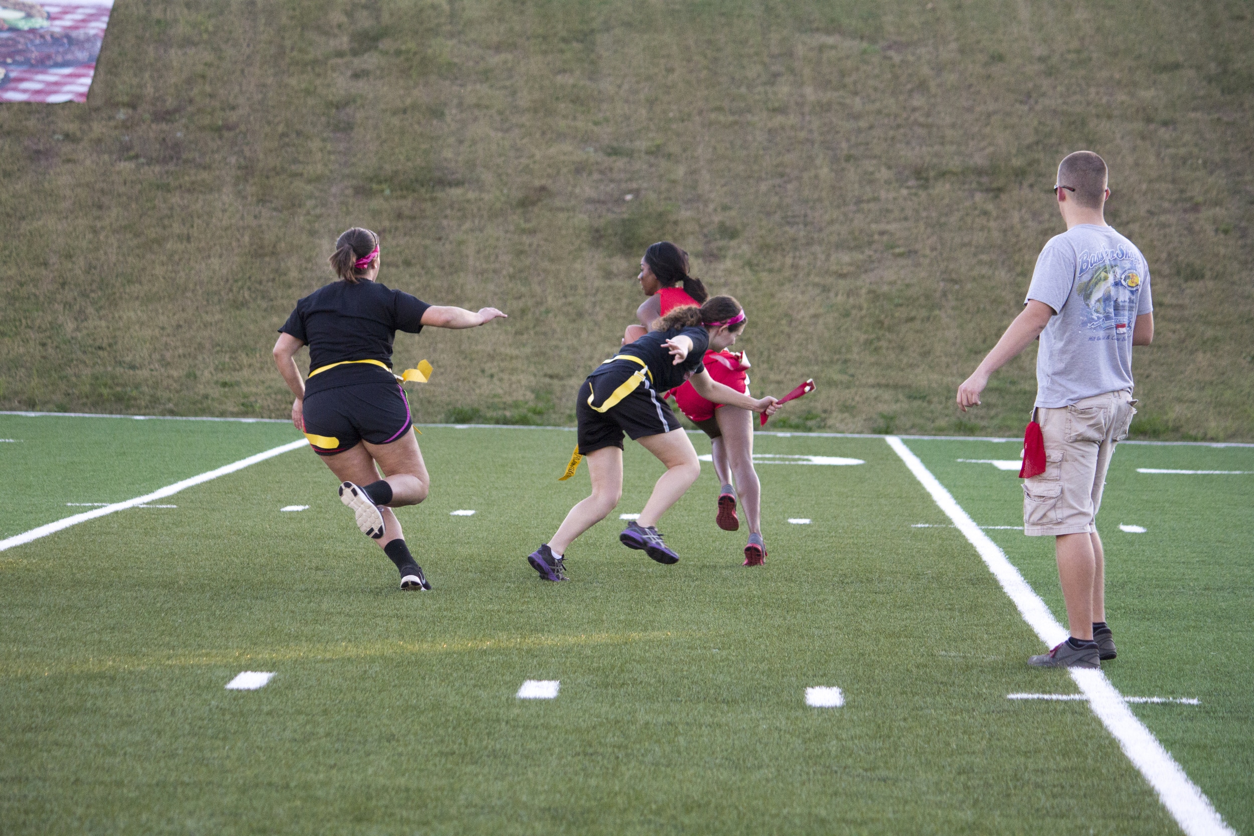  Junior Rachel Alley pulls the flag and snuffs out the Senior team's play before it can even begin.&nbsp; 