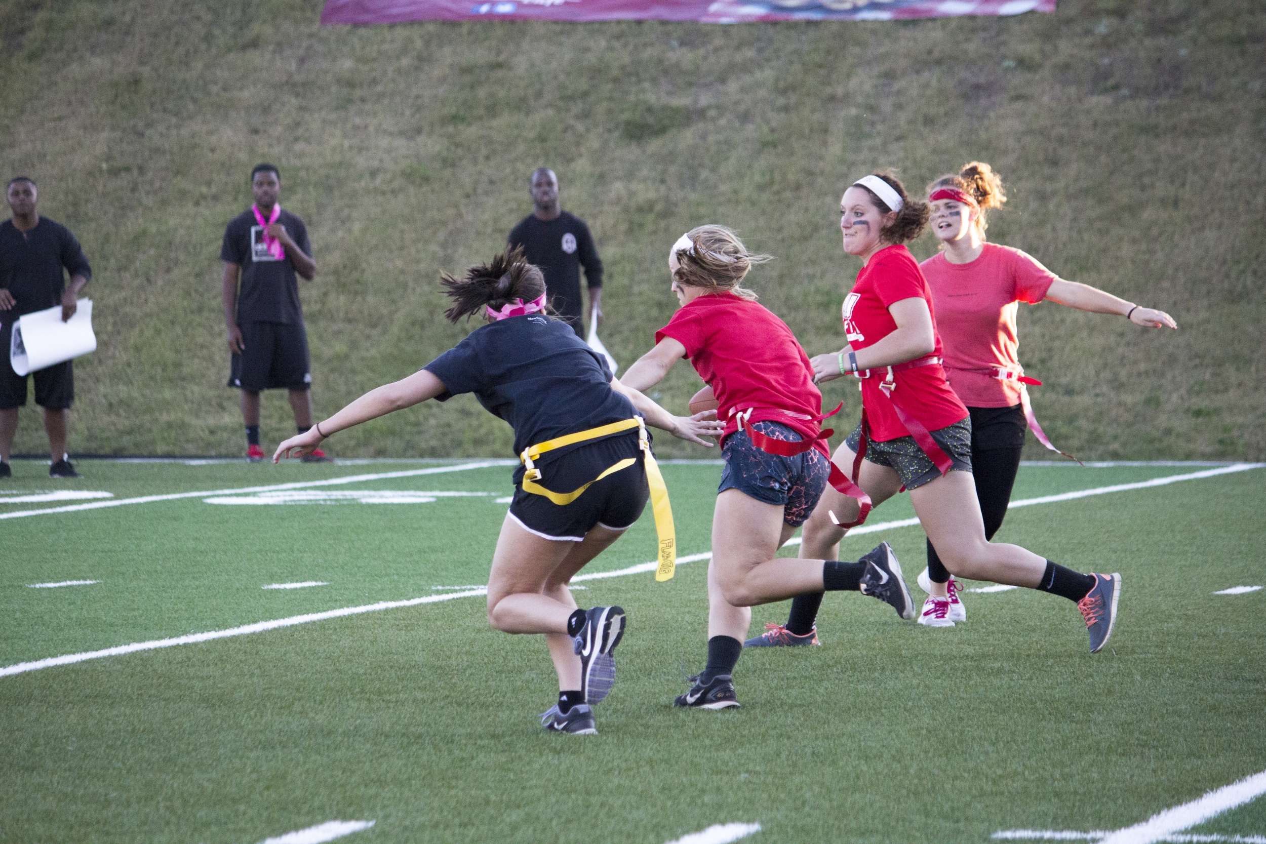  Senior Sarah Armstrong runs down the field trying to block her flag being pulled.&nbsp; 