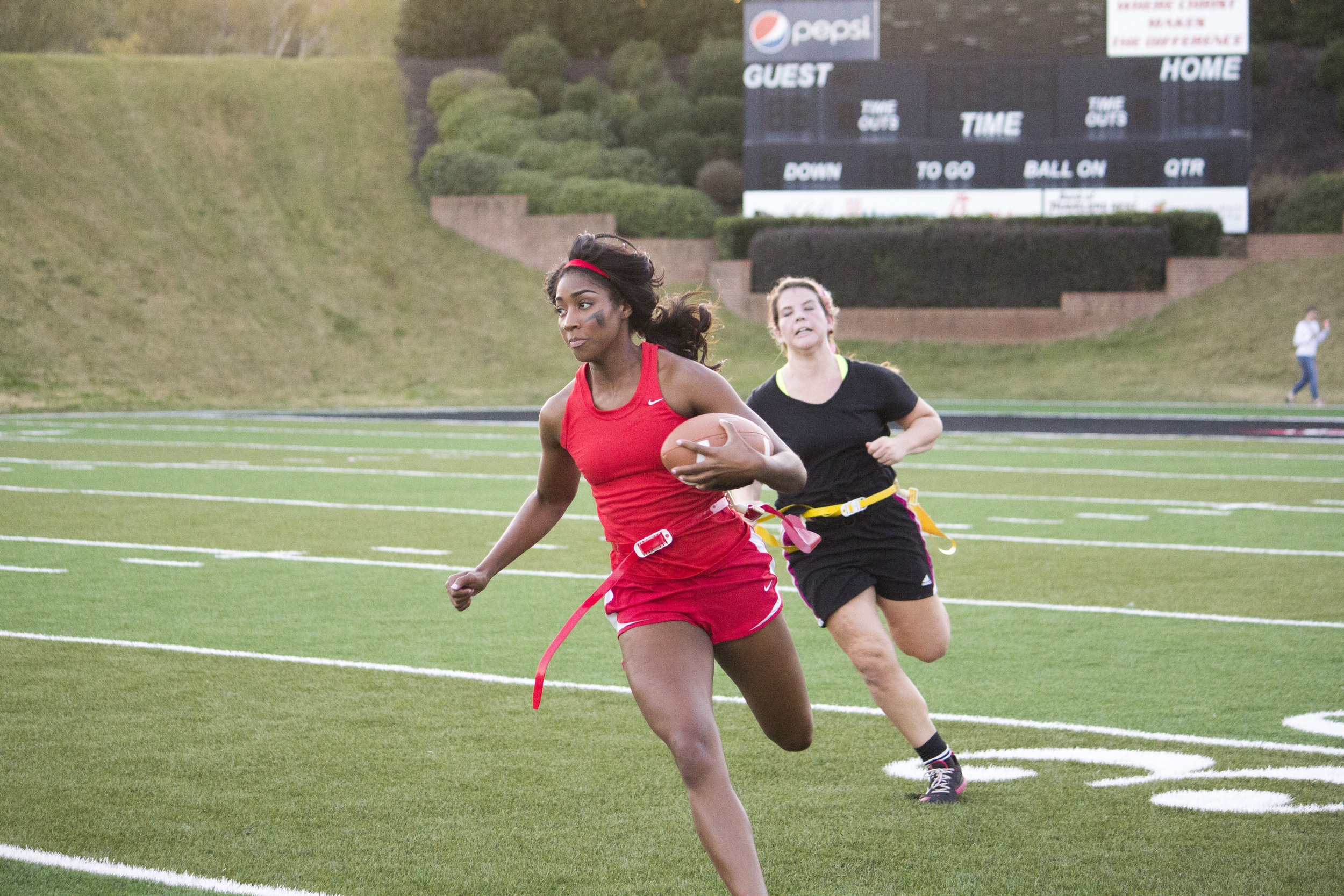  Senior Jackia Whetstone races down the sideline.&nbsp; 