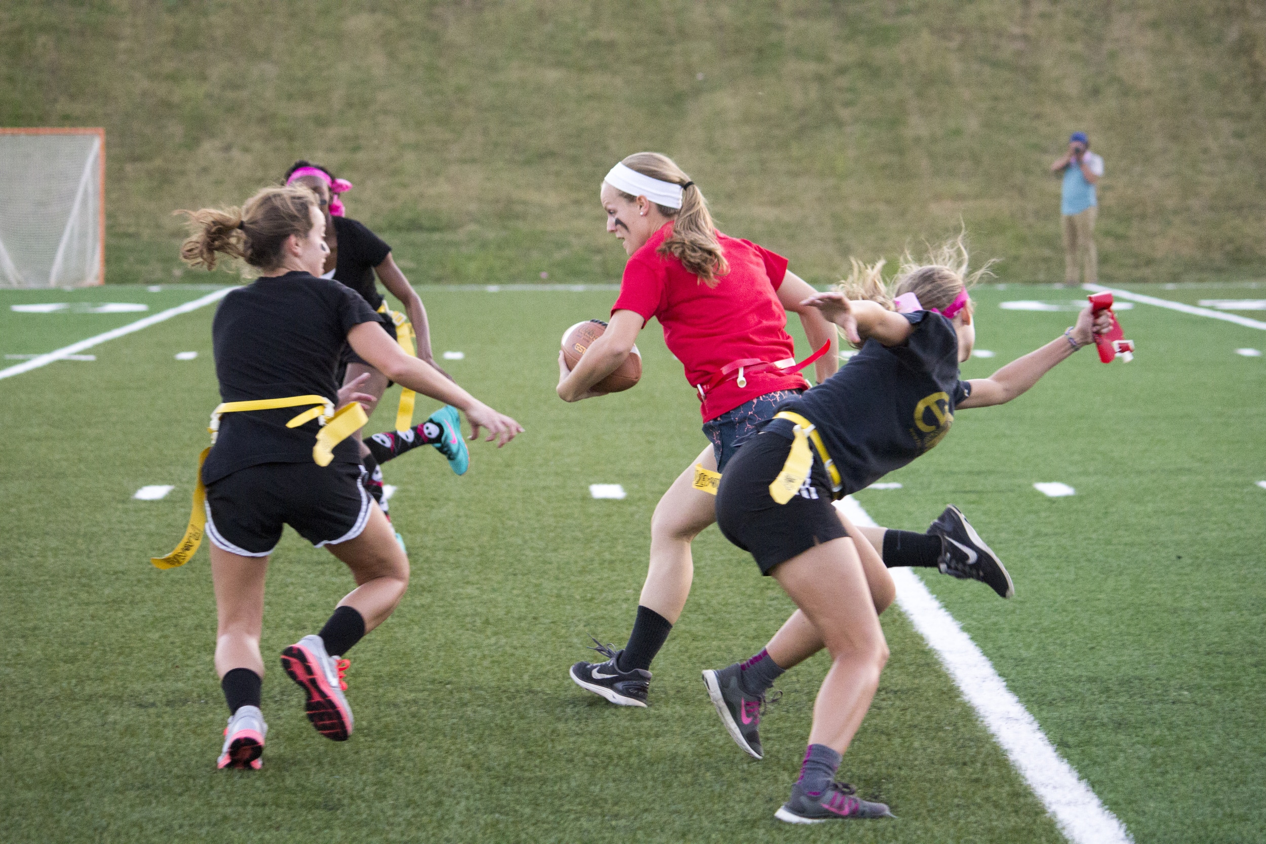  Junior Lauren Childs snags Sarah Armstrong's flag before she runs past her.&nbsp; 